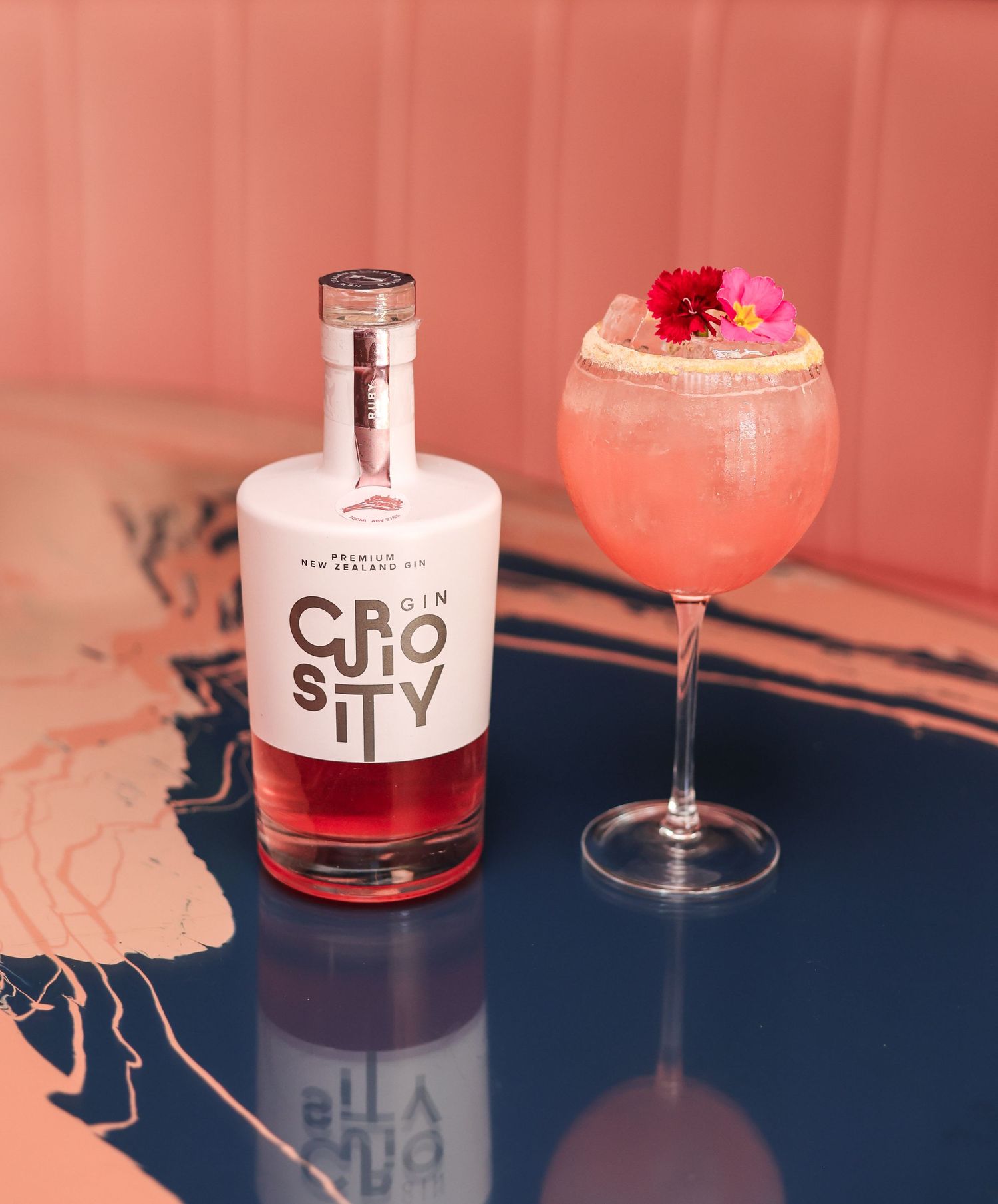 Curiosity pink gin with a pink cocktail at Gin Gin Christchurch
