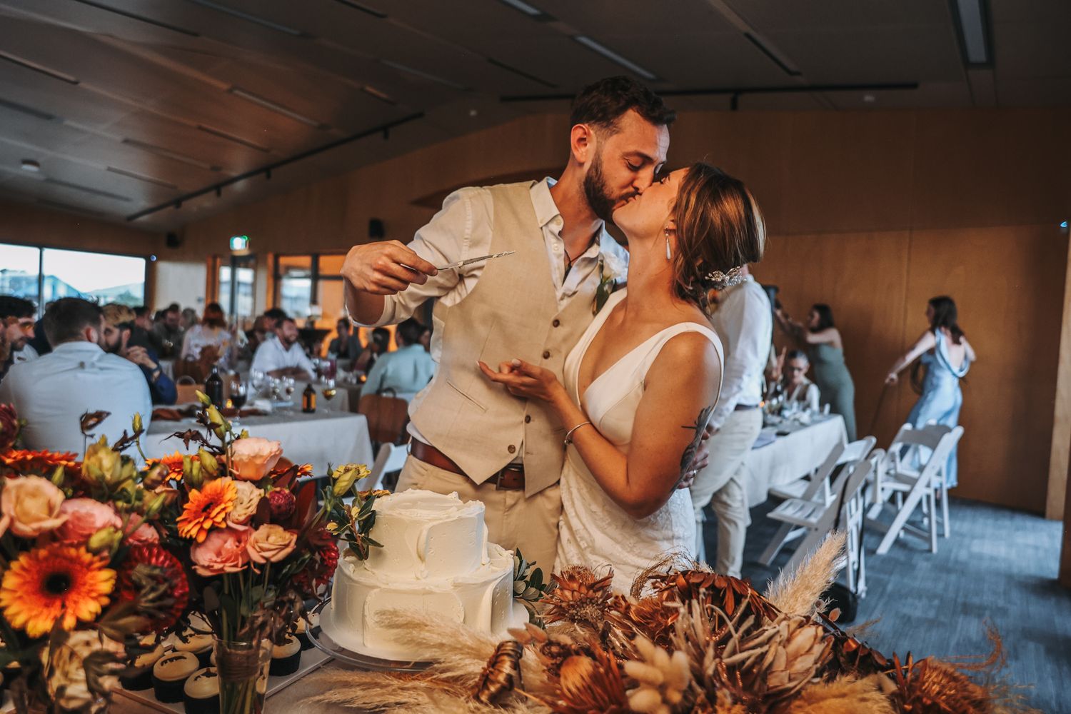 Bride and groom cut their wedding cake