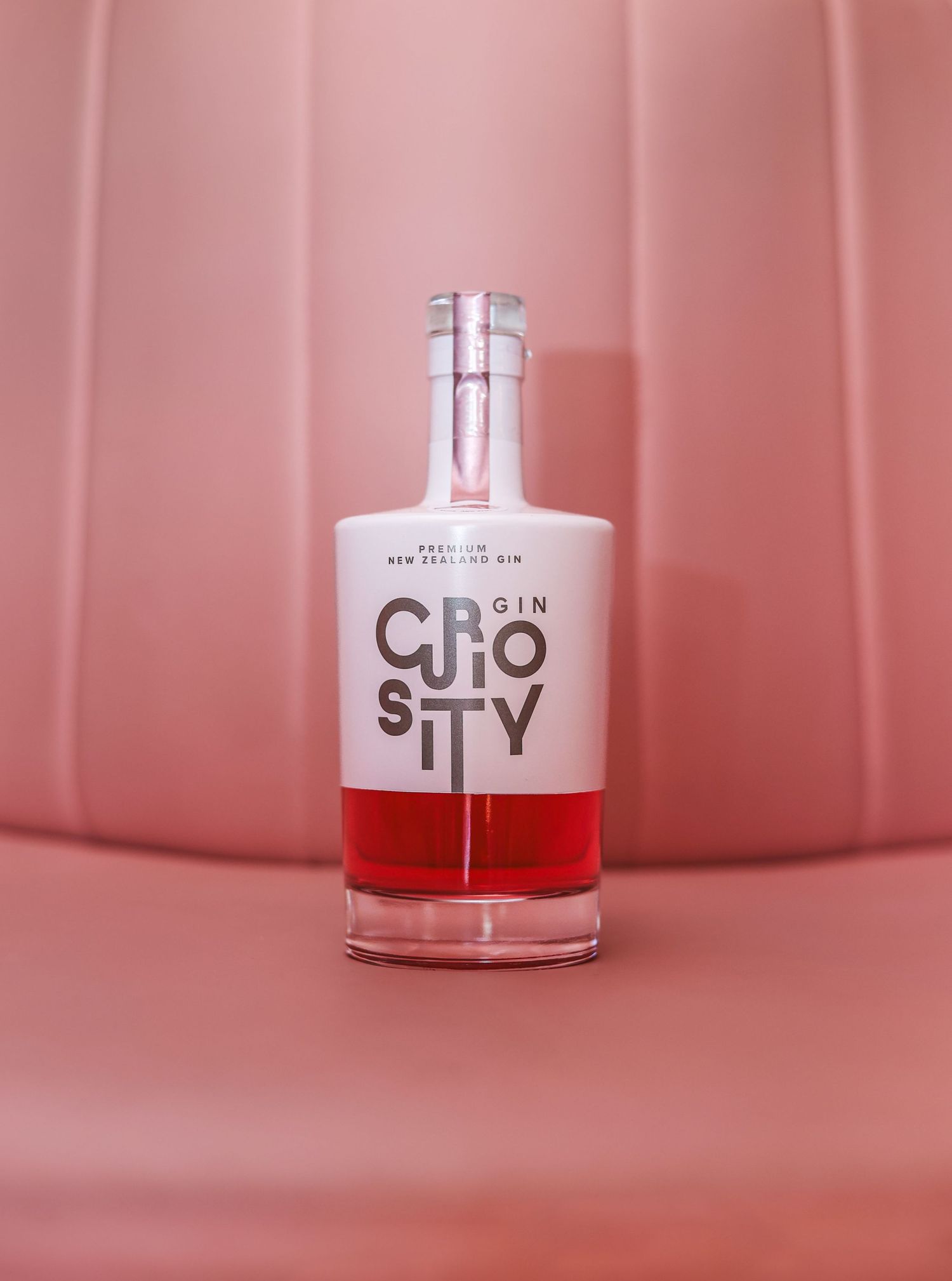 Curiosity pink gin bottle