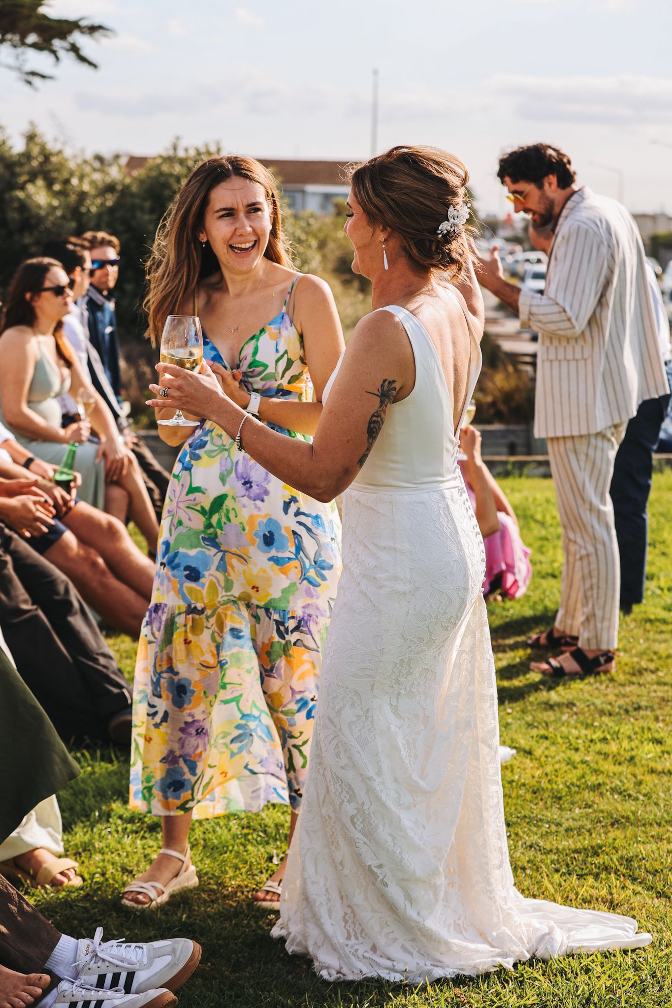 Bride mingling with guests at cocktail hour