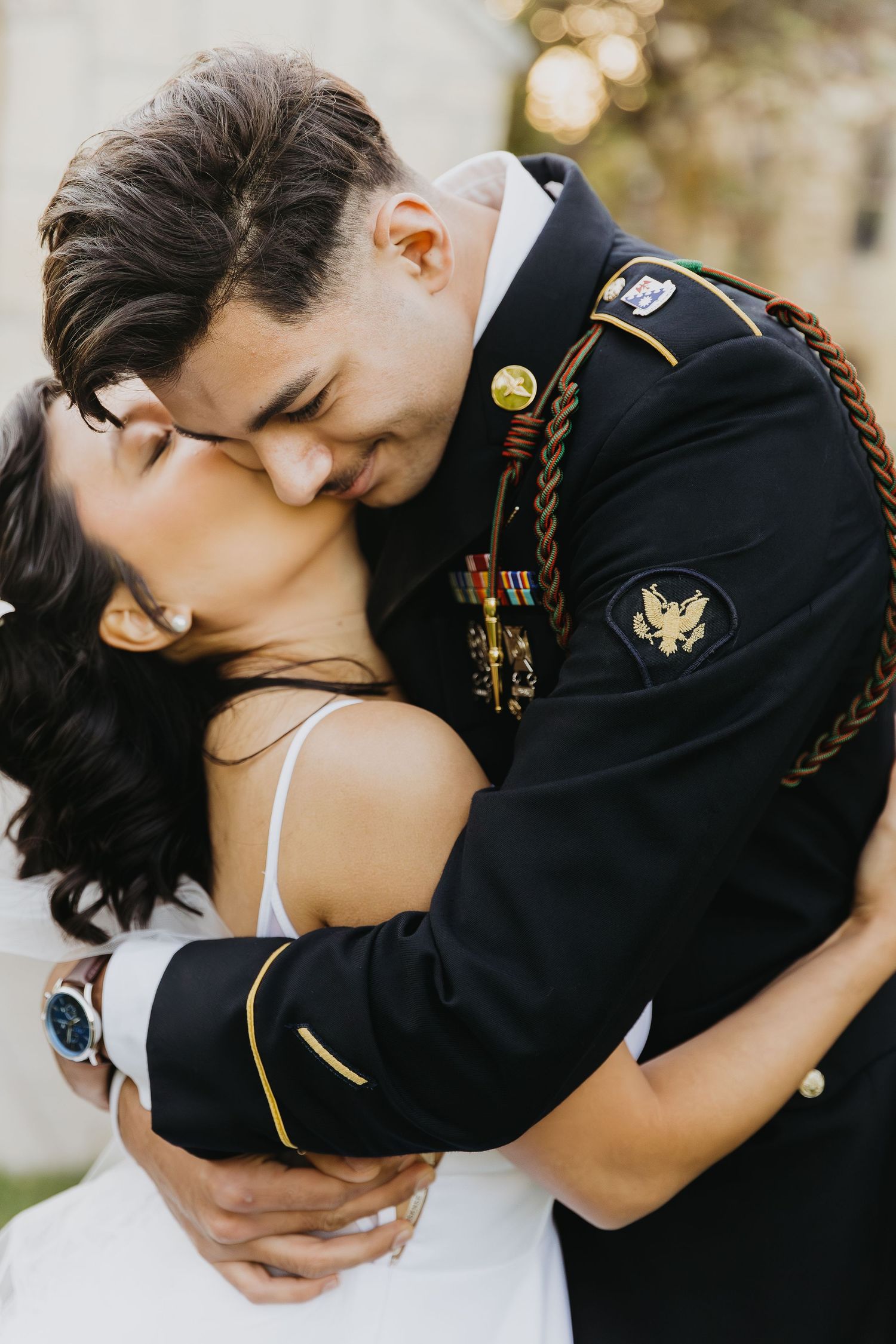 An intimate romantic moment between newlyweds during their wedding photoshoot.