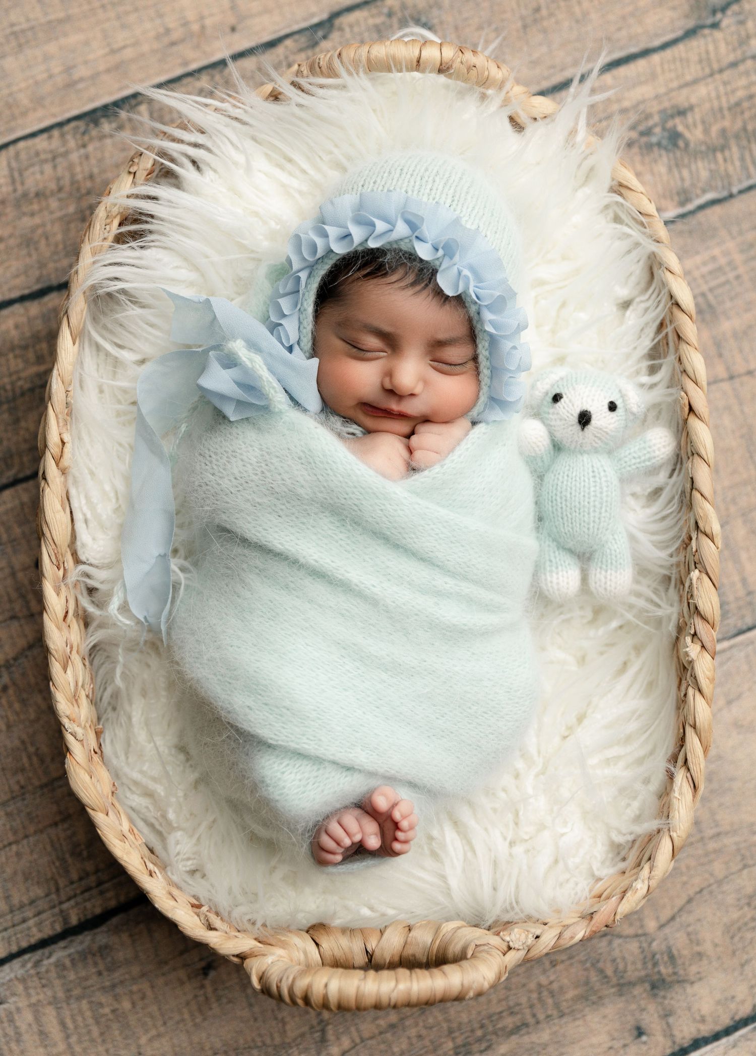A cute themed newborn photography session featuring adorable props and creative setups, capturing precious moments near you.