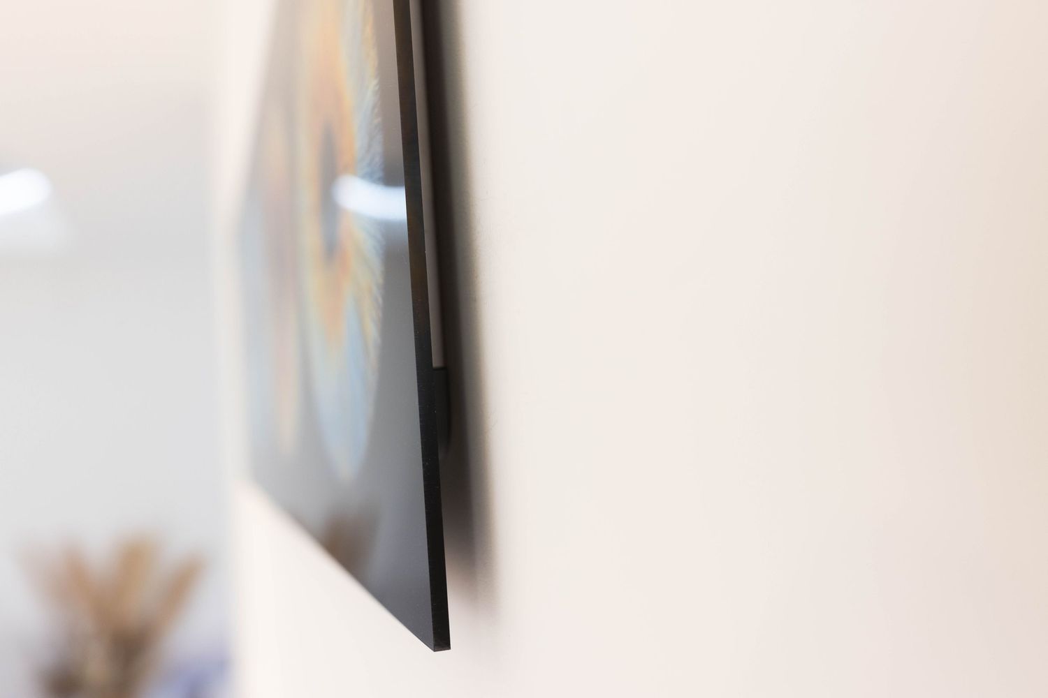 Side view of a framed iris print showing professional mounting depth.