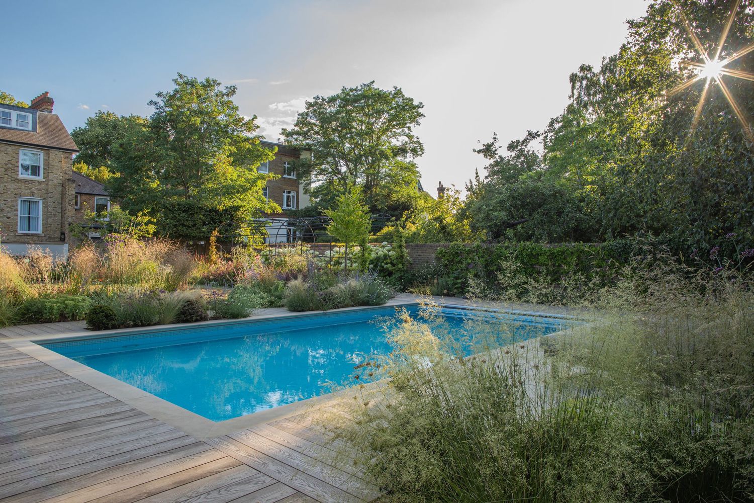 Pool Garden - Credit Landscaping Solutions Ltd www.landscapingsolutionsltd.co.uk and Clare McMillan Garden Design www.cmgd.uk