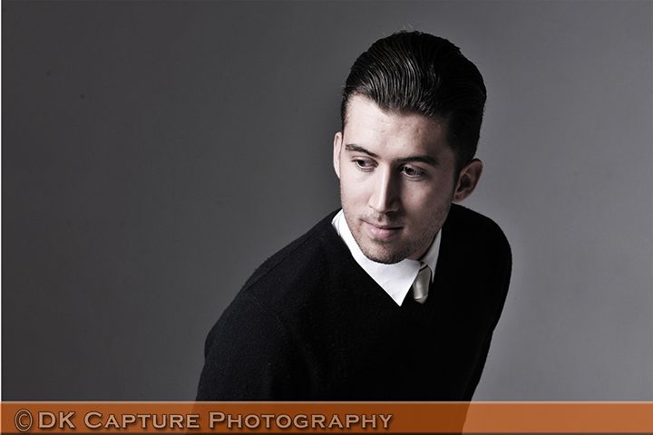 Professional studio headshot image of a person / group
