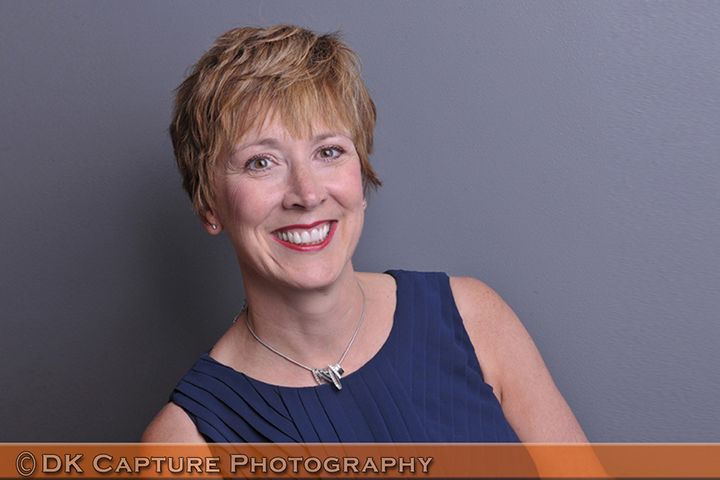 Professional studio headshot image of a person / group