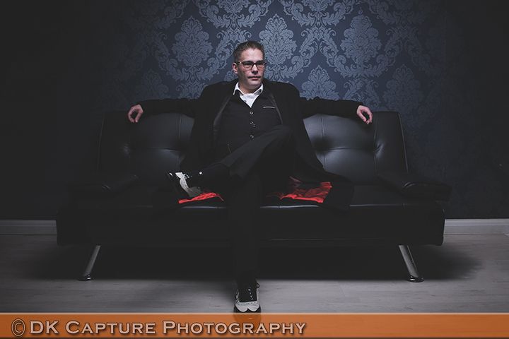 Professional studio headshot image of a person / group