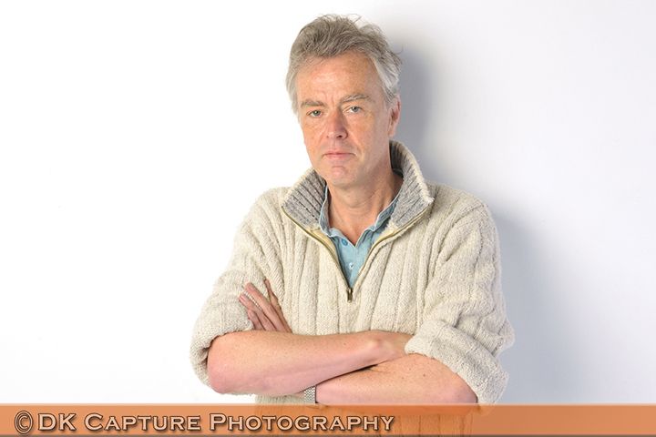 Professional studio headshot image of a person / group