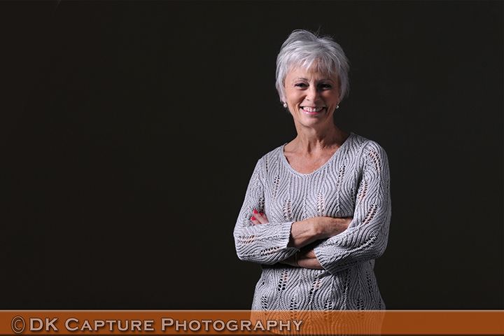 Professional studio headshot image of a person / group