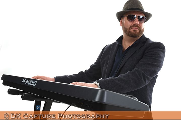 Professional studio headshot image of a person / group
