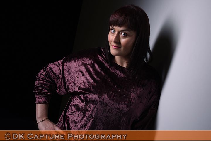 Professional studio headshot image of a person / group