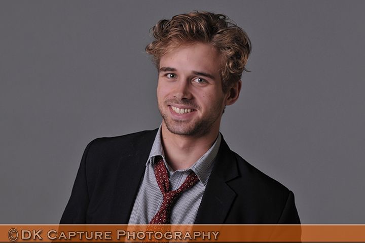 Professional studio headshot image of a person / group