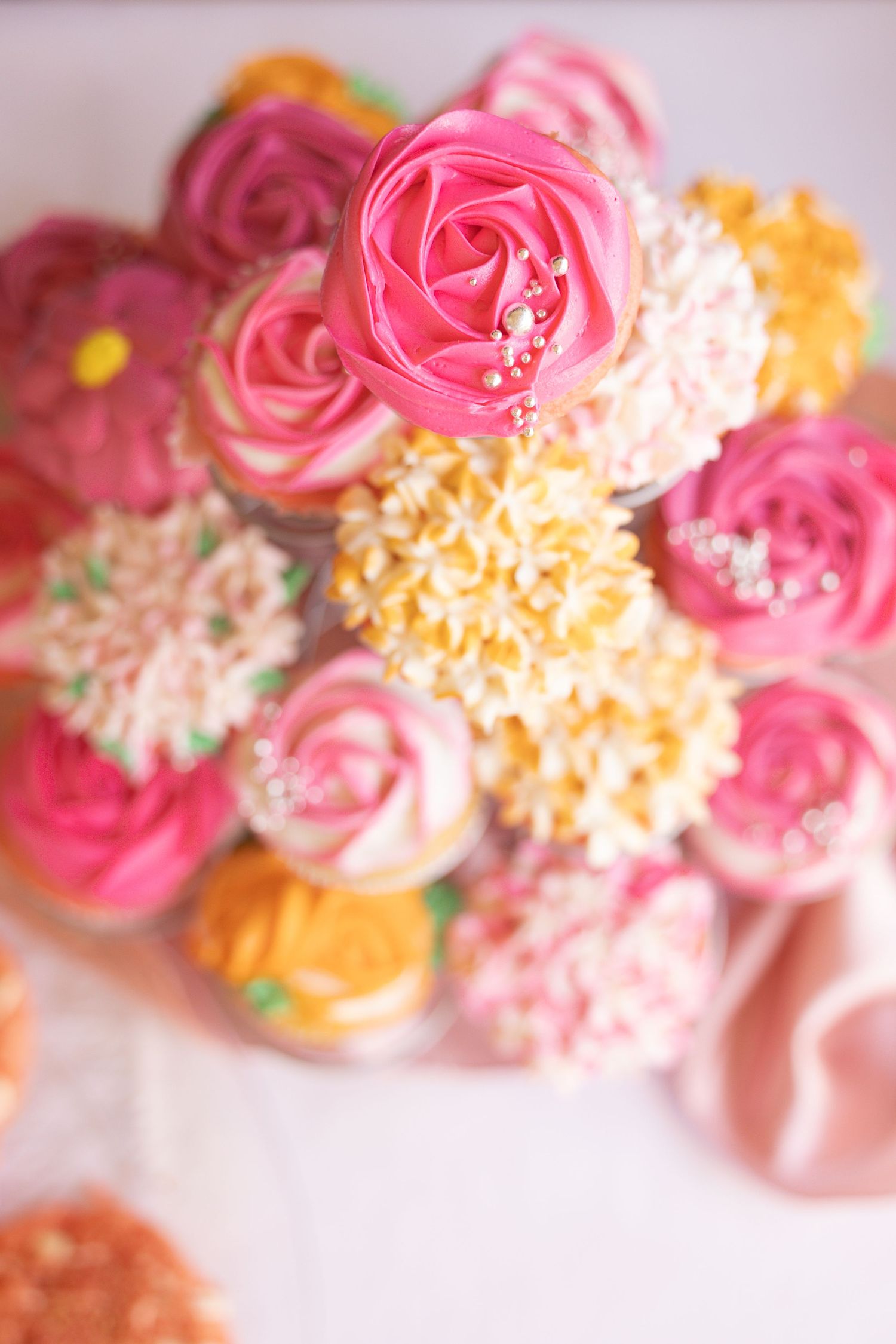 floral decorated cupcake in a cupcake stand