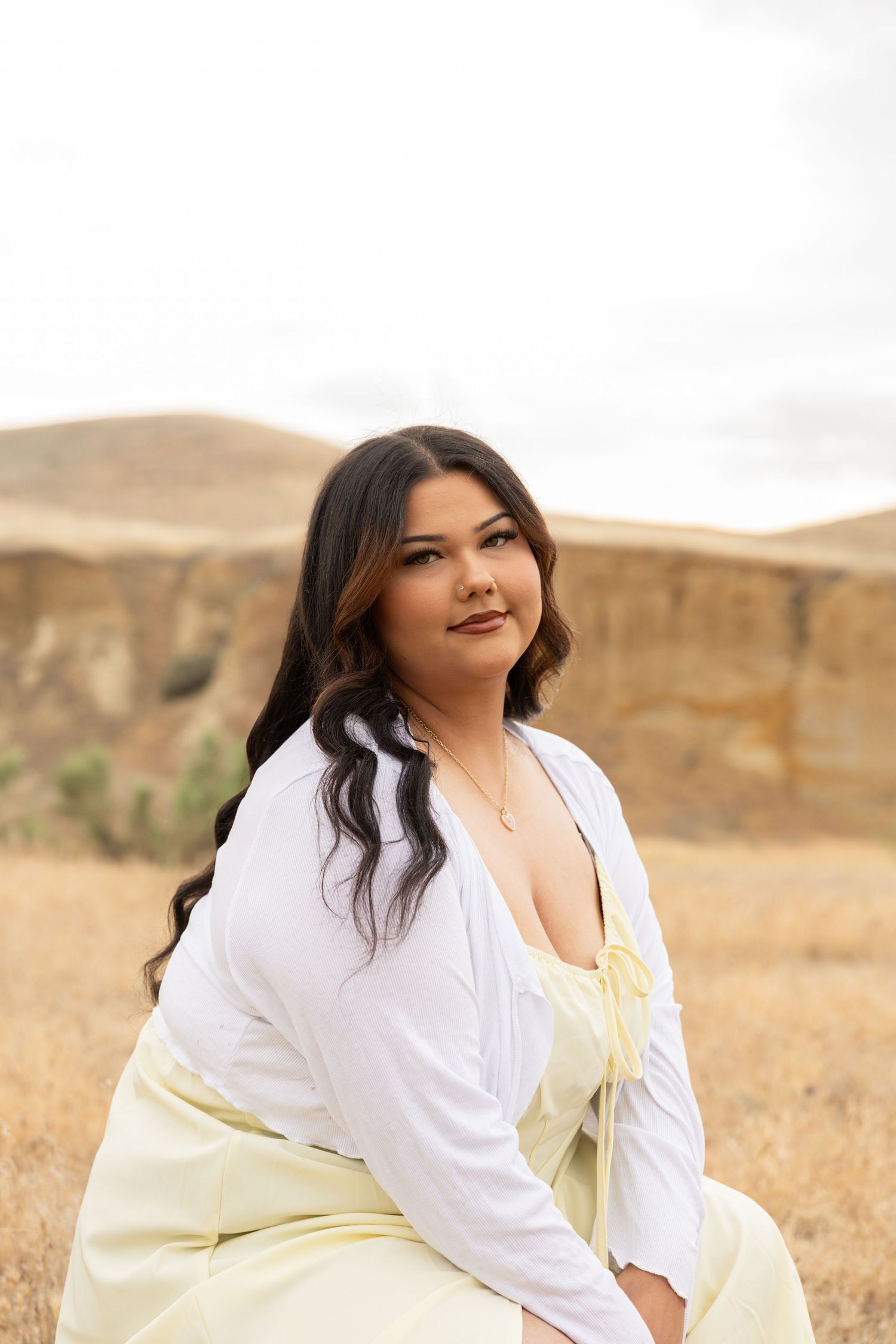 high school senior crouching down