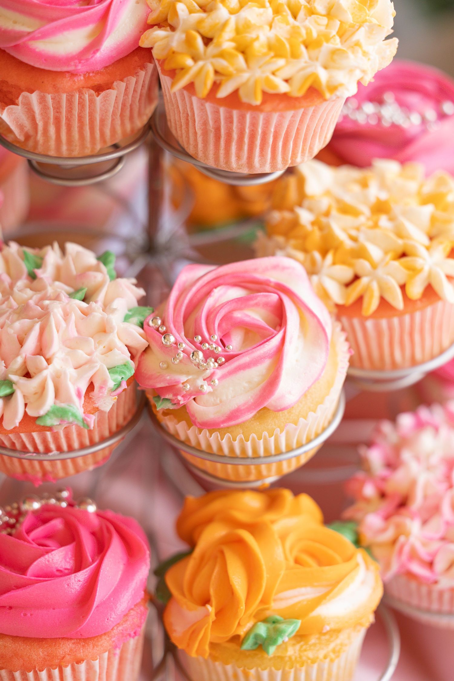 floral decorated cupcake in a cupcake stand
