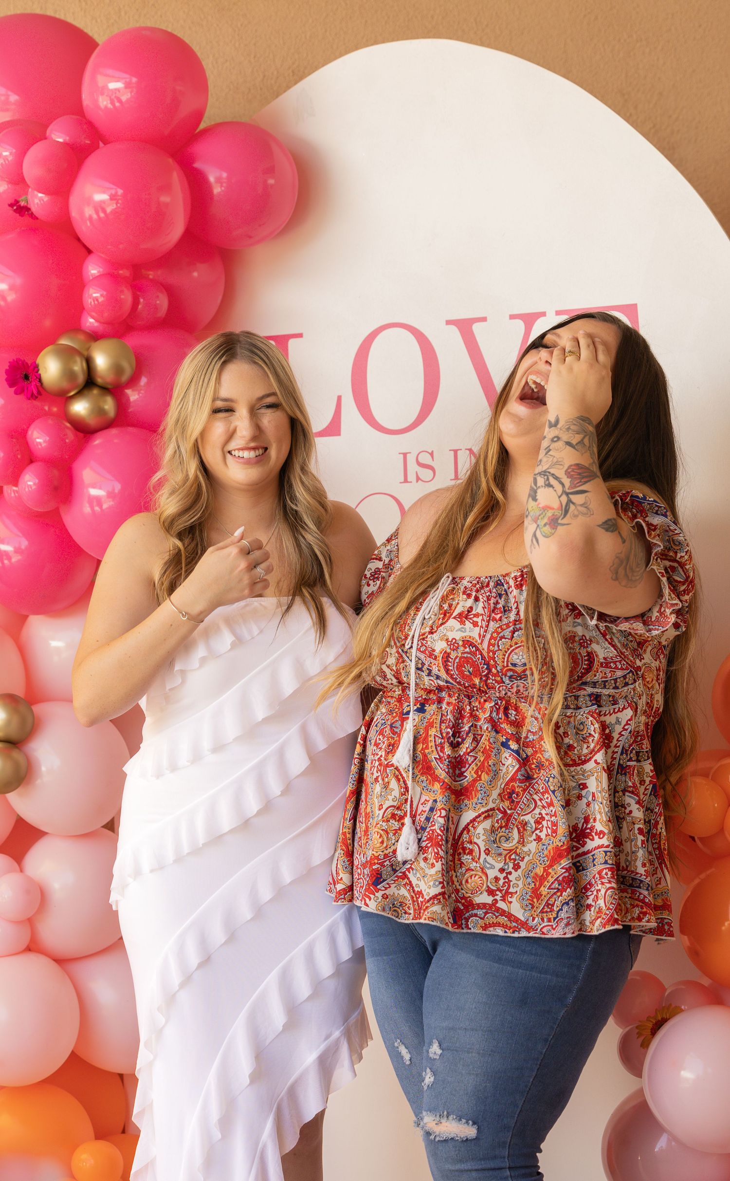 2 woman laughing