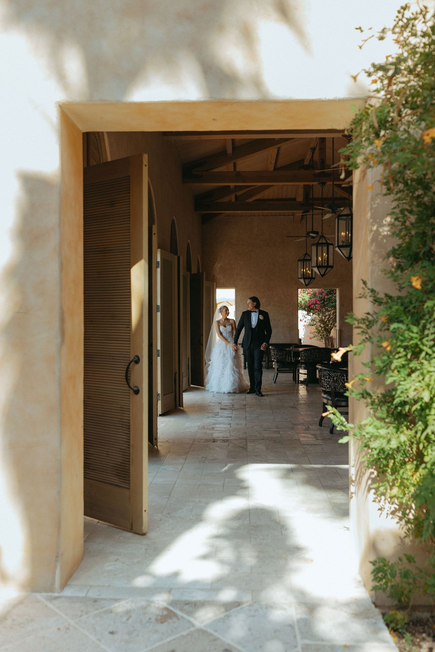 A candid, documentary-style wedding photo capturing real moments from celebrations in Central Illinois and Chicago. The image highlights the