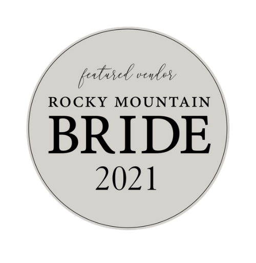 A minimalist circular logo for Rocky Mountain Bride 2021 in black and gray.