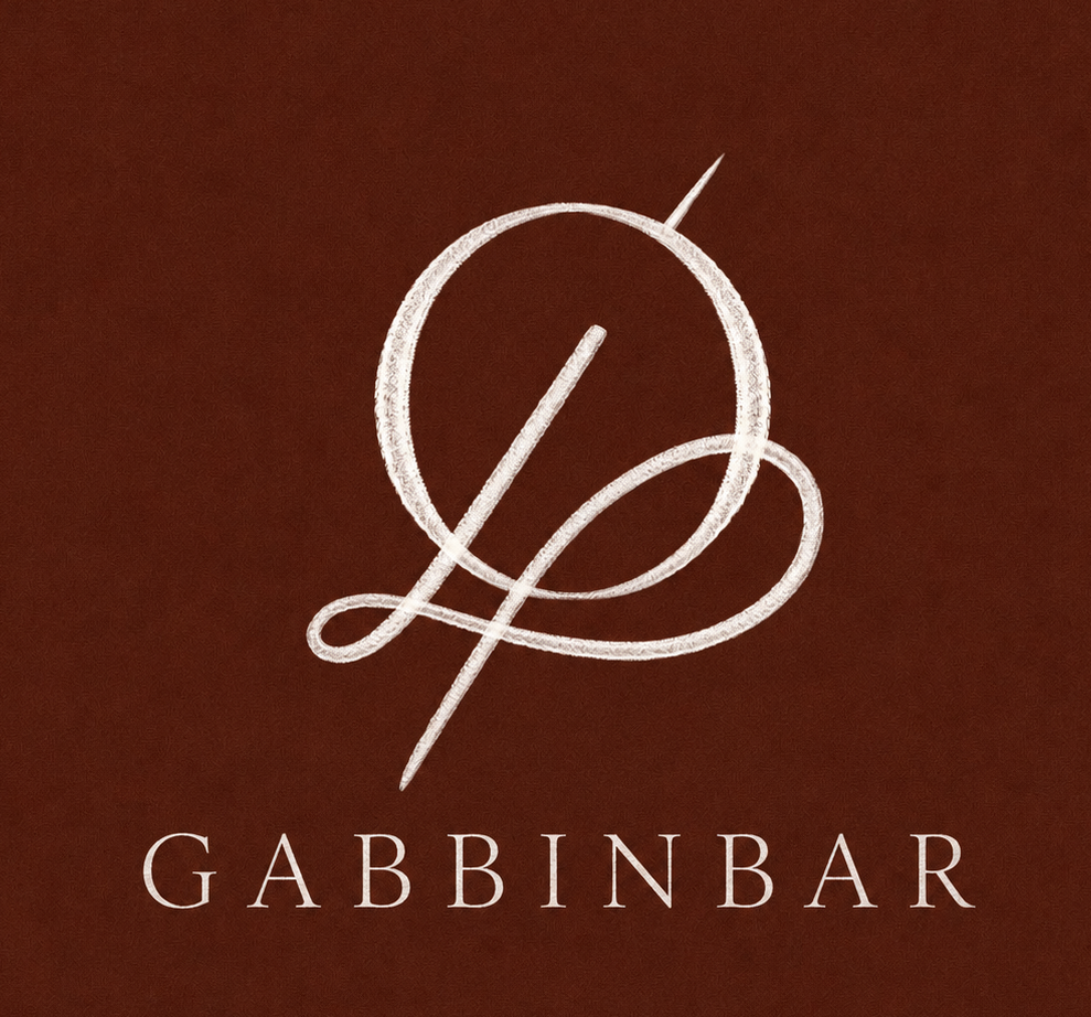 Gabbinbar estate logo with decorative script monogram on a dark brown background.