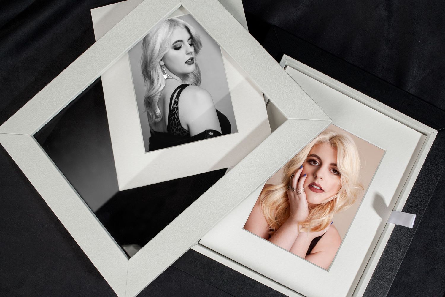 Photo prints displayed in overlapping white frames against dark background.