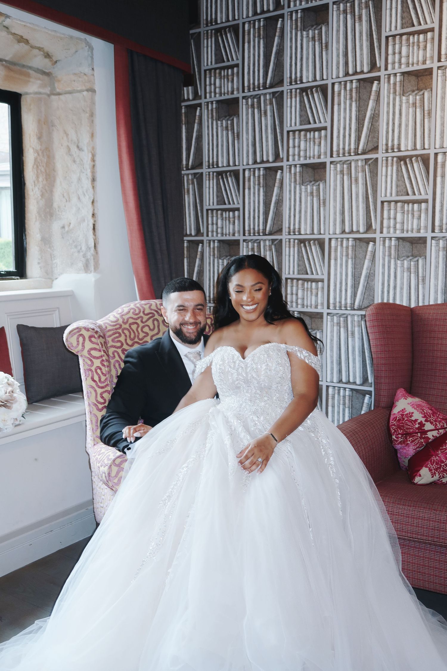 Bride and groom sharing a relaxed portrait together inside their wedding venue, captured by luxury wedding content creator Unveil by Hollie