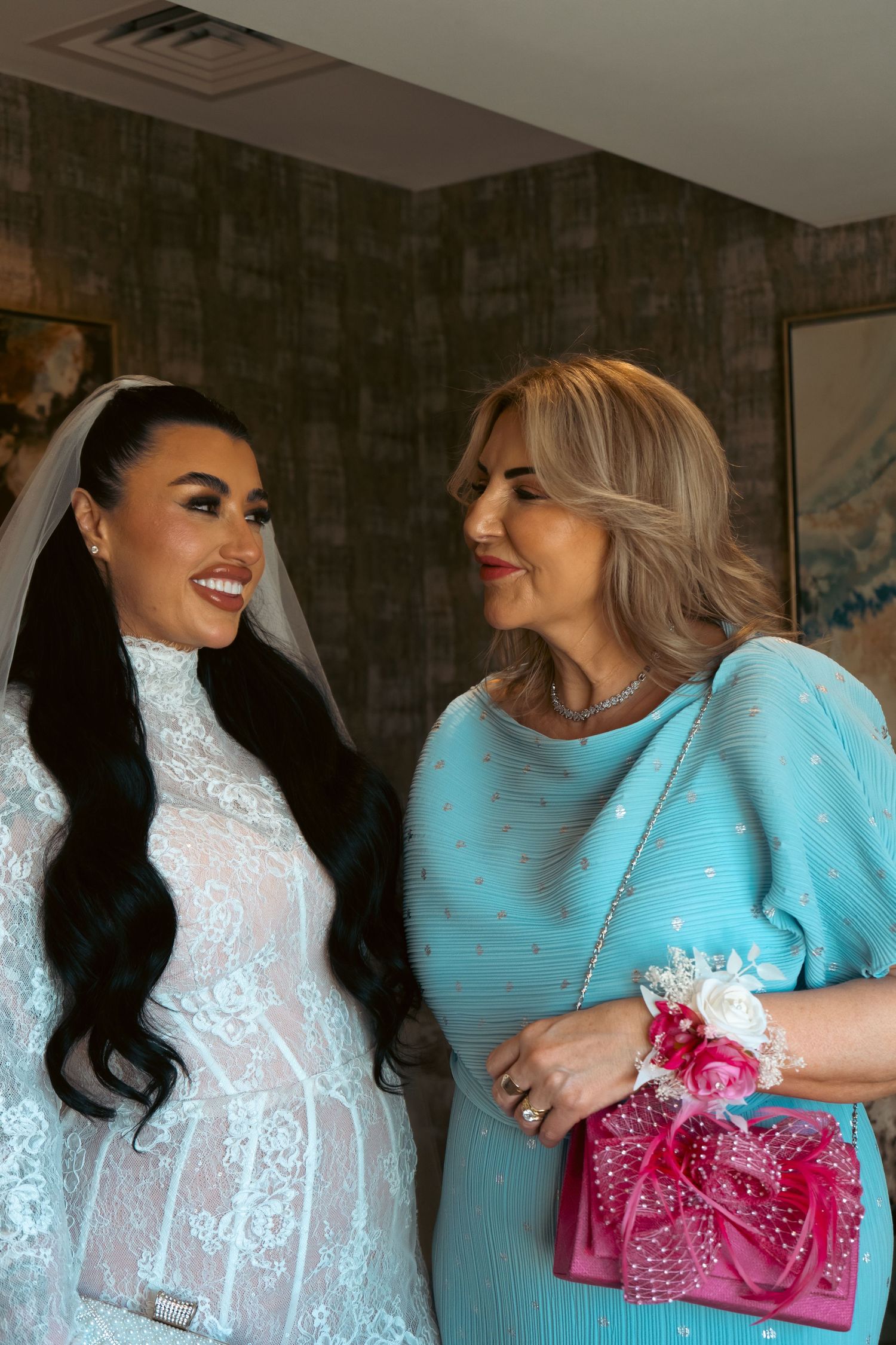 Bride sharing an emotional moment with her mother before her wedding ceremony, captured by luxury wedding content creator Unveil by Hollie