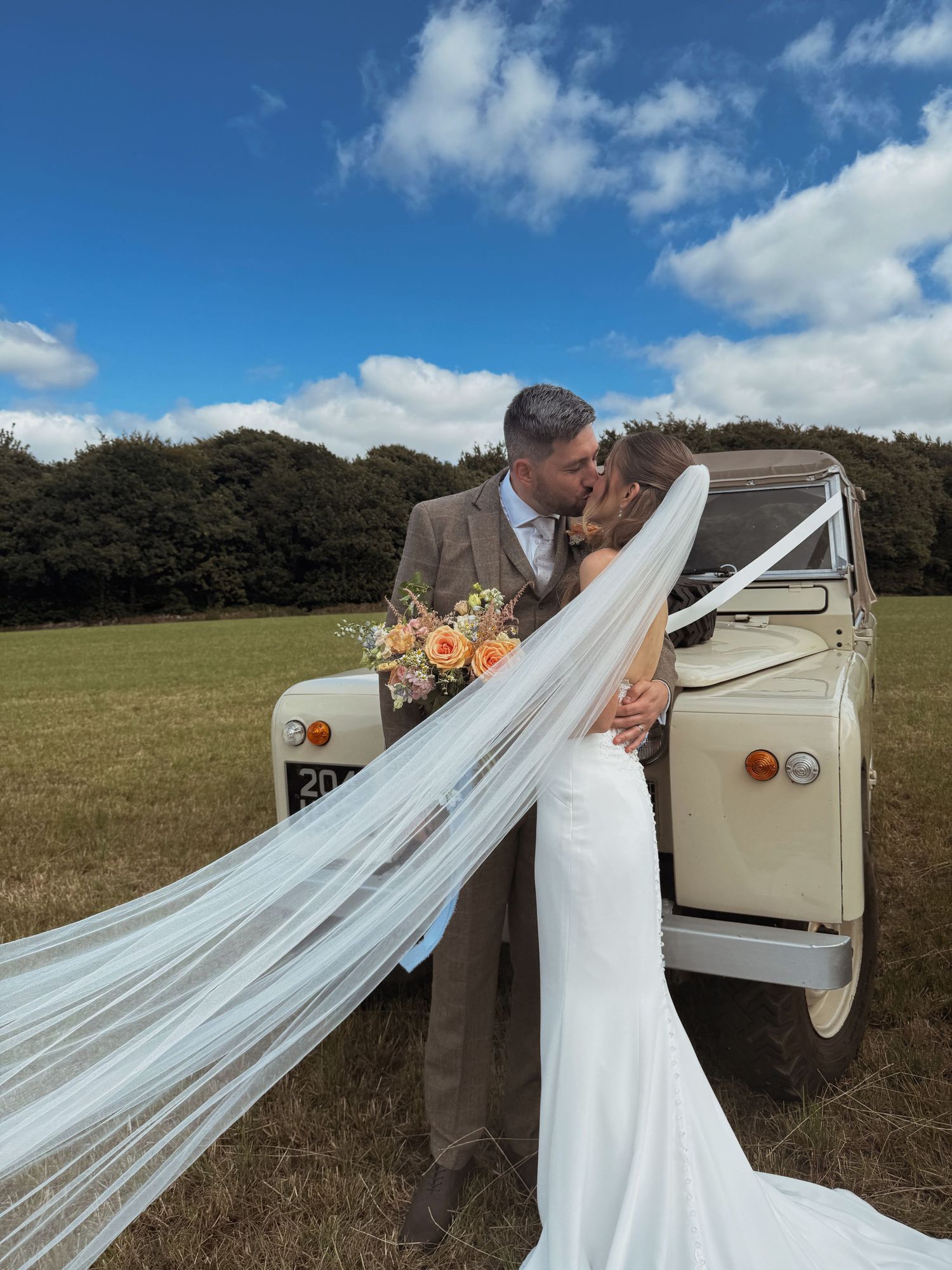 bride and groom outside