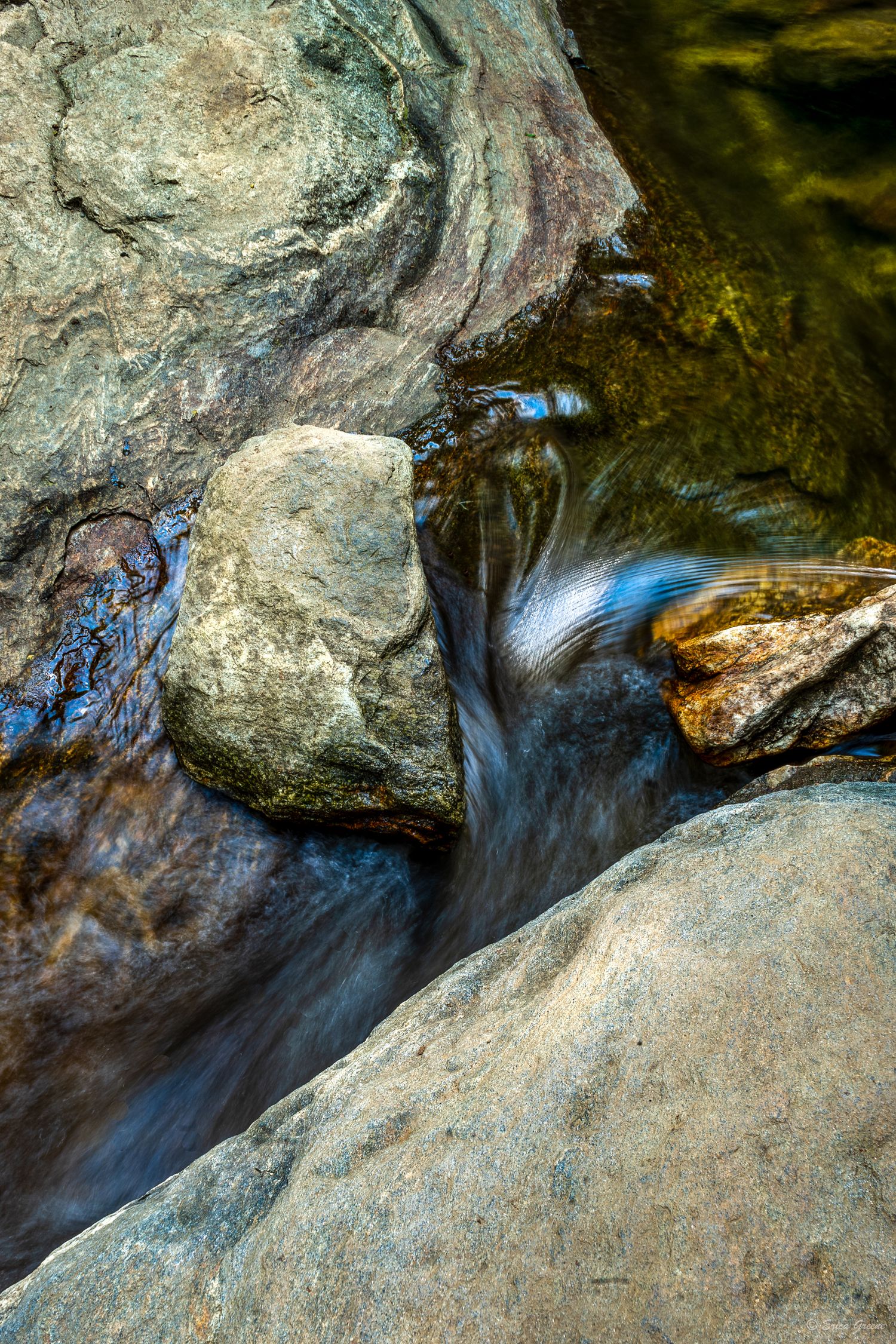 close up silky water flowing between rocks stream Carolina mountains intimate nature fine art print