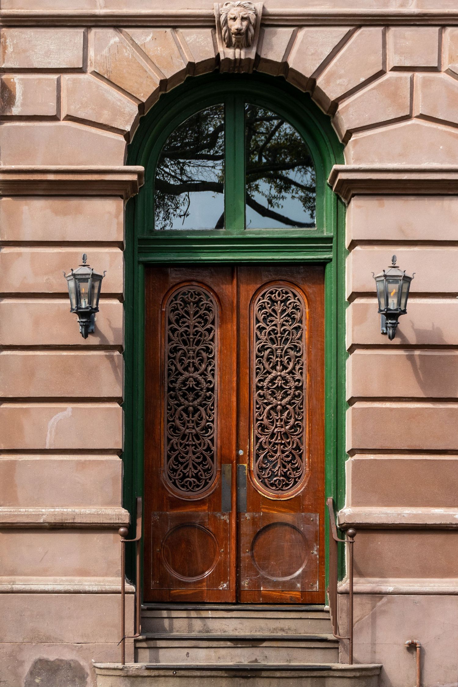 ornate carved wood double door green archway lion keystone gas lanterns Charleston South Carolina architectural fine art print