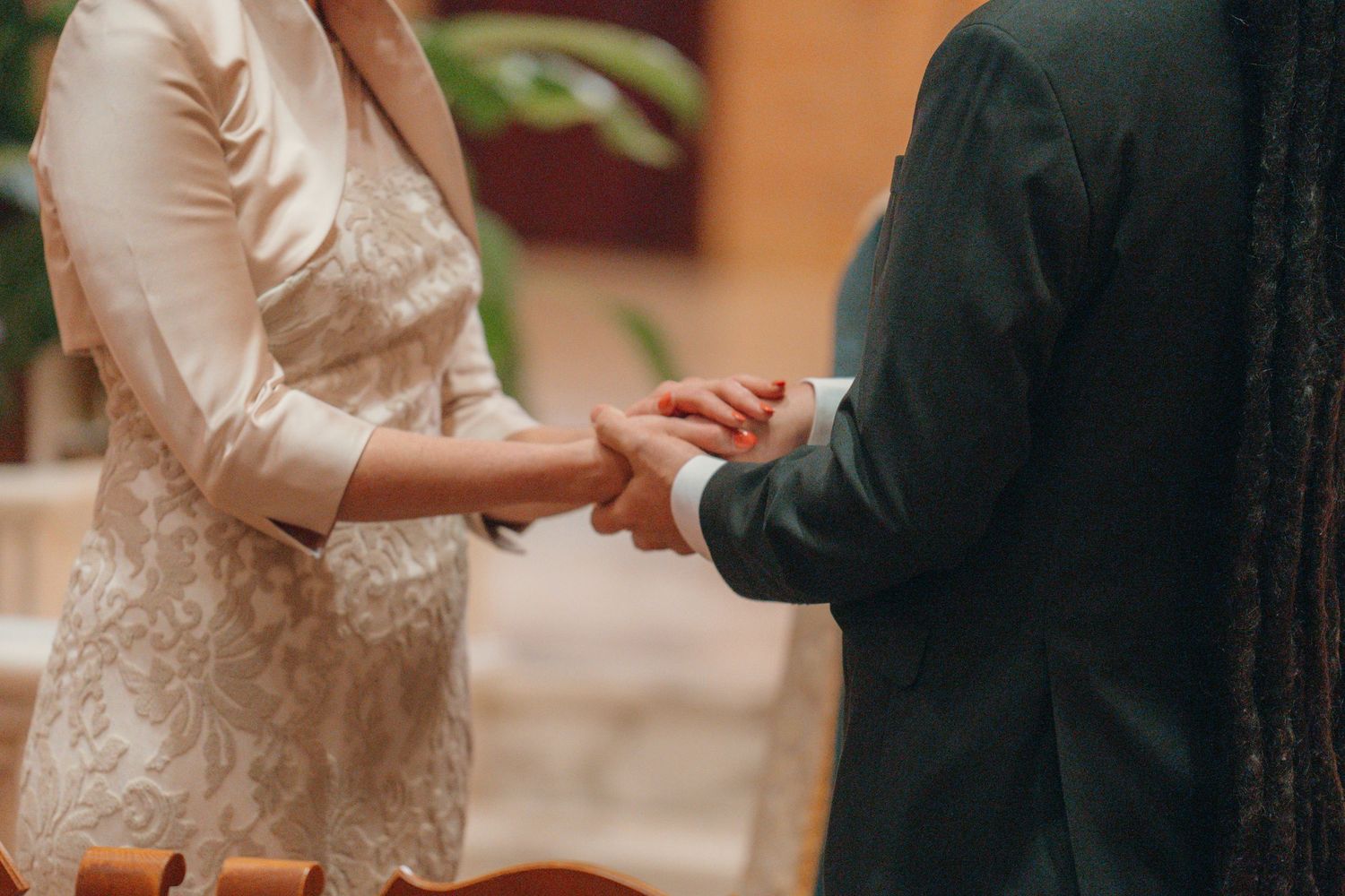 Exchange of rings during a Catholic wedding ceremony