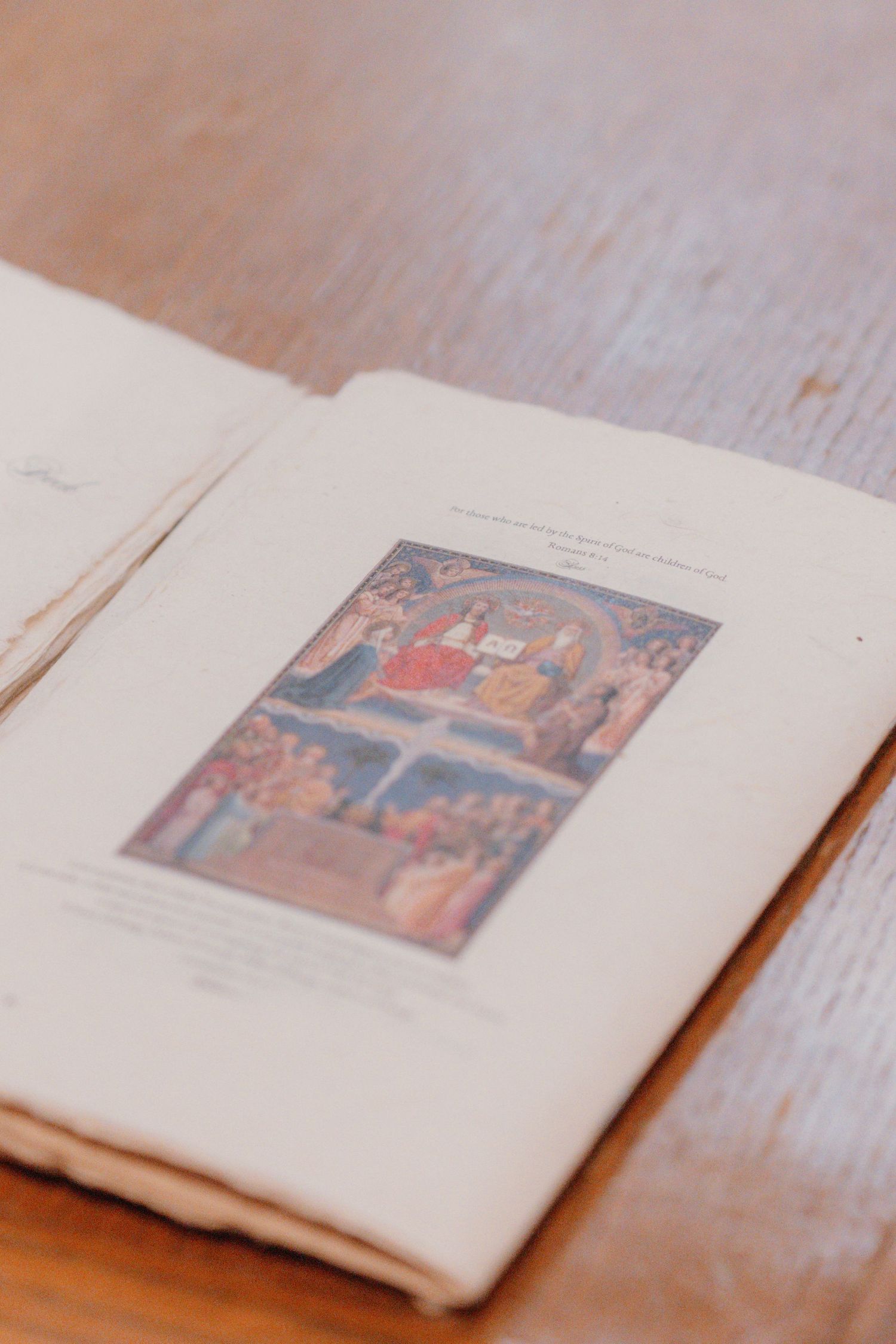 Wedding Mass program with a religious painting on the cover