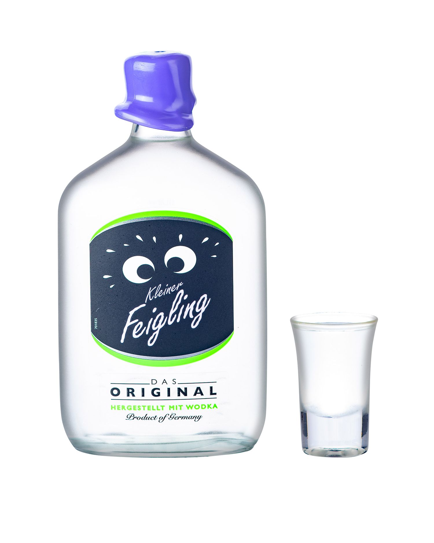Kleiner Feigling Original fig-flavored vodka flat flask bottle with purple cap and empty shot glass.