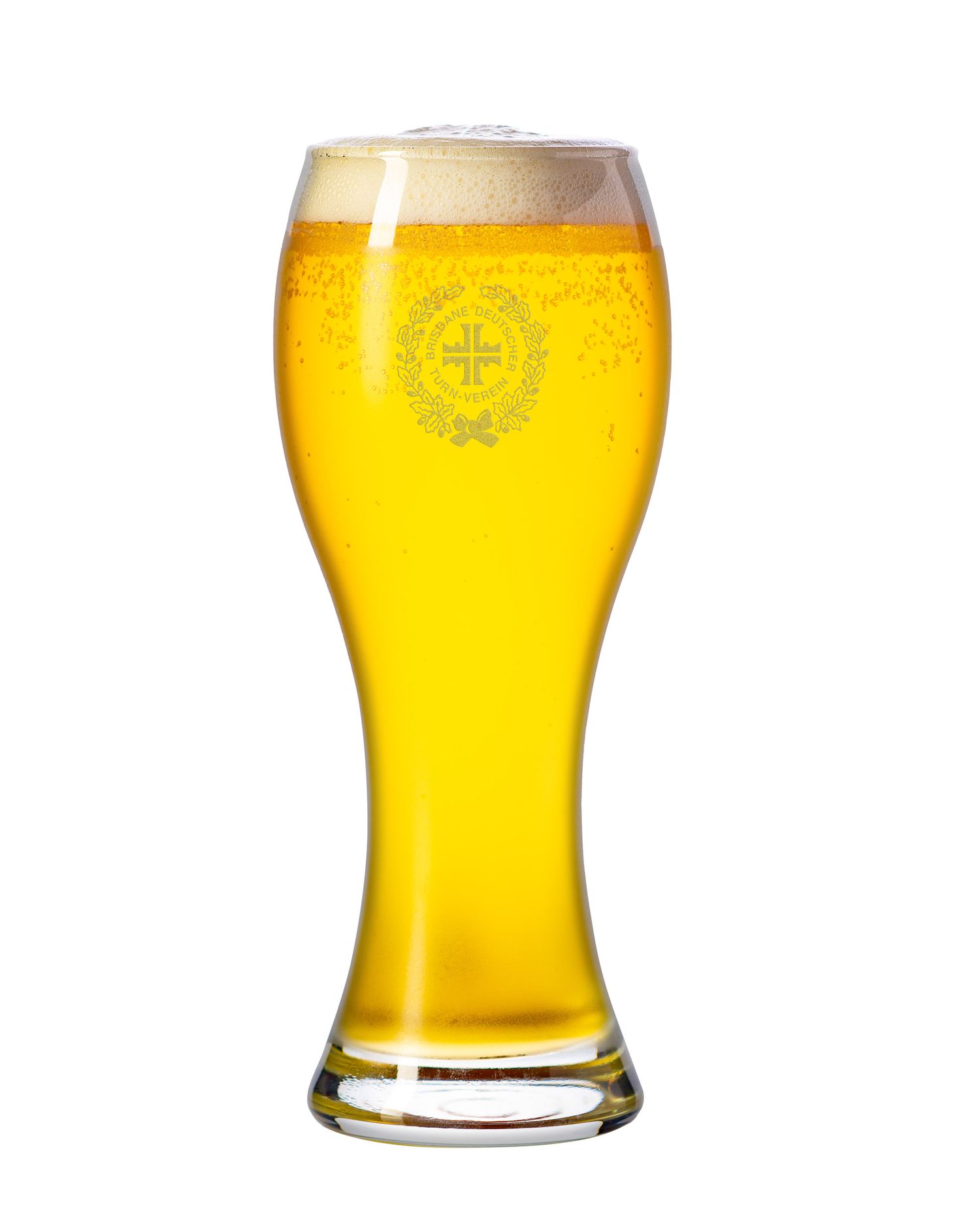Crystal clear wheat beer glass with engraved cross crest logo filled with golden lager and foam.