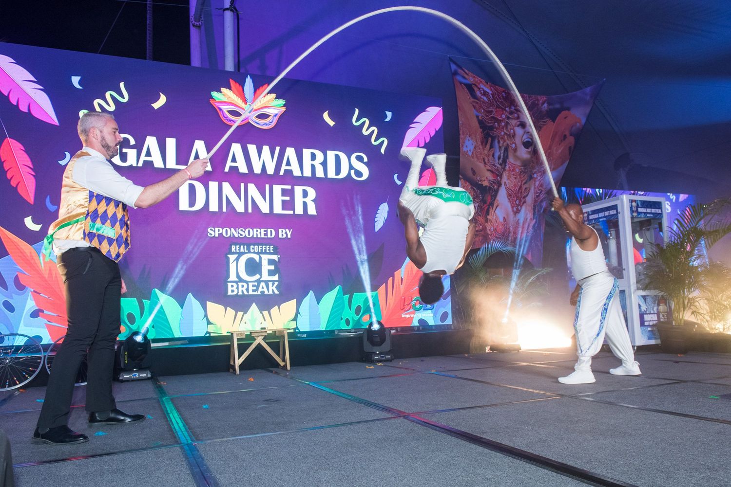 Gala Awards Dinner sign with performers during an Ice Break sponsored outdoor evening ceremony.