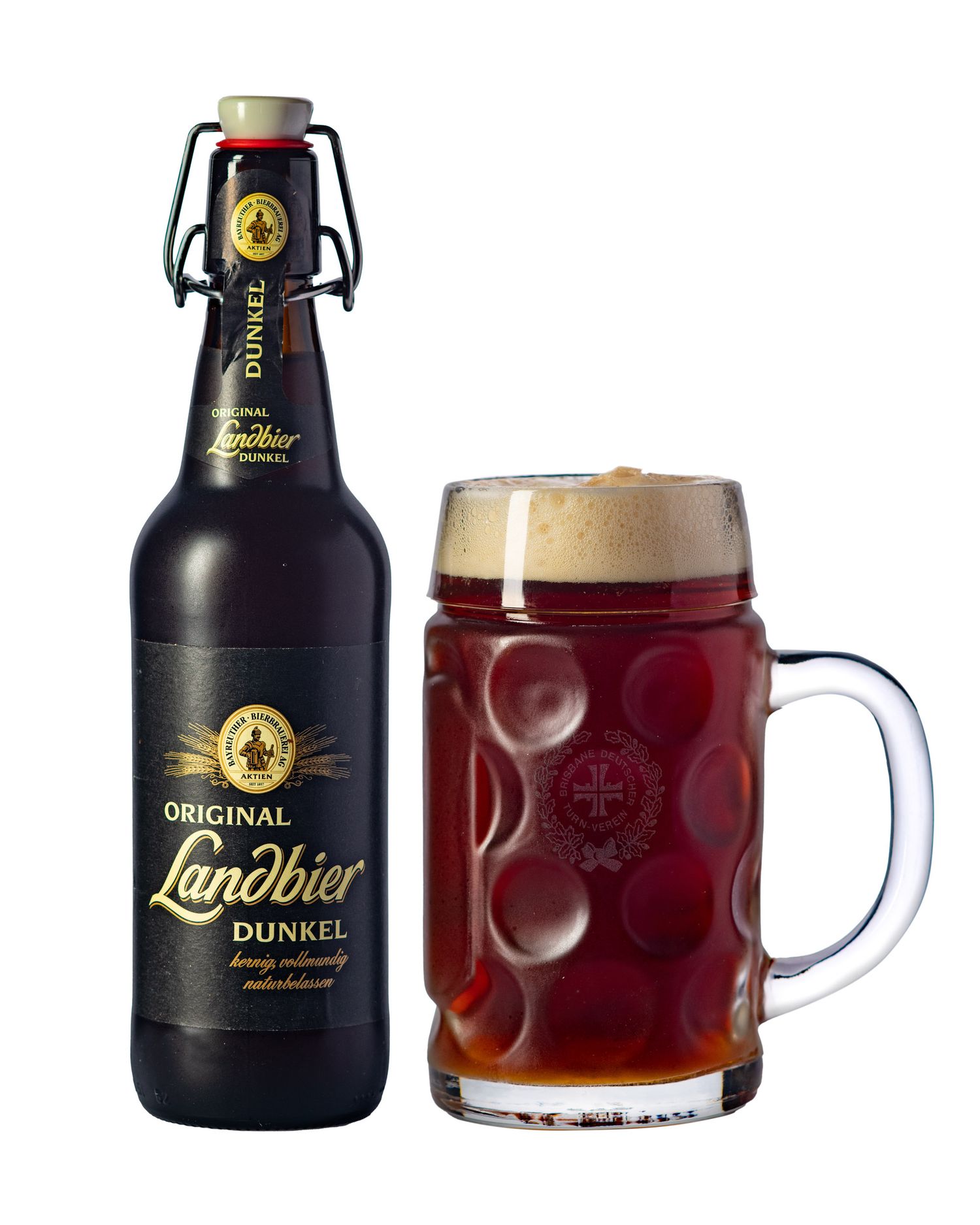 Original Landbier Dunkel dark beer bottle with a full glass mug on white background.