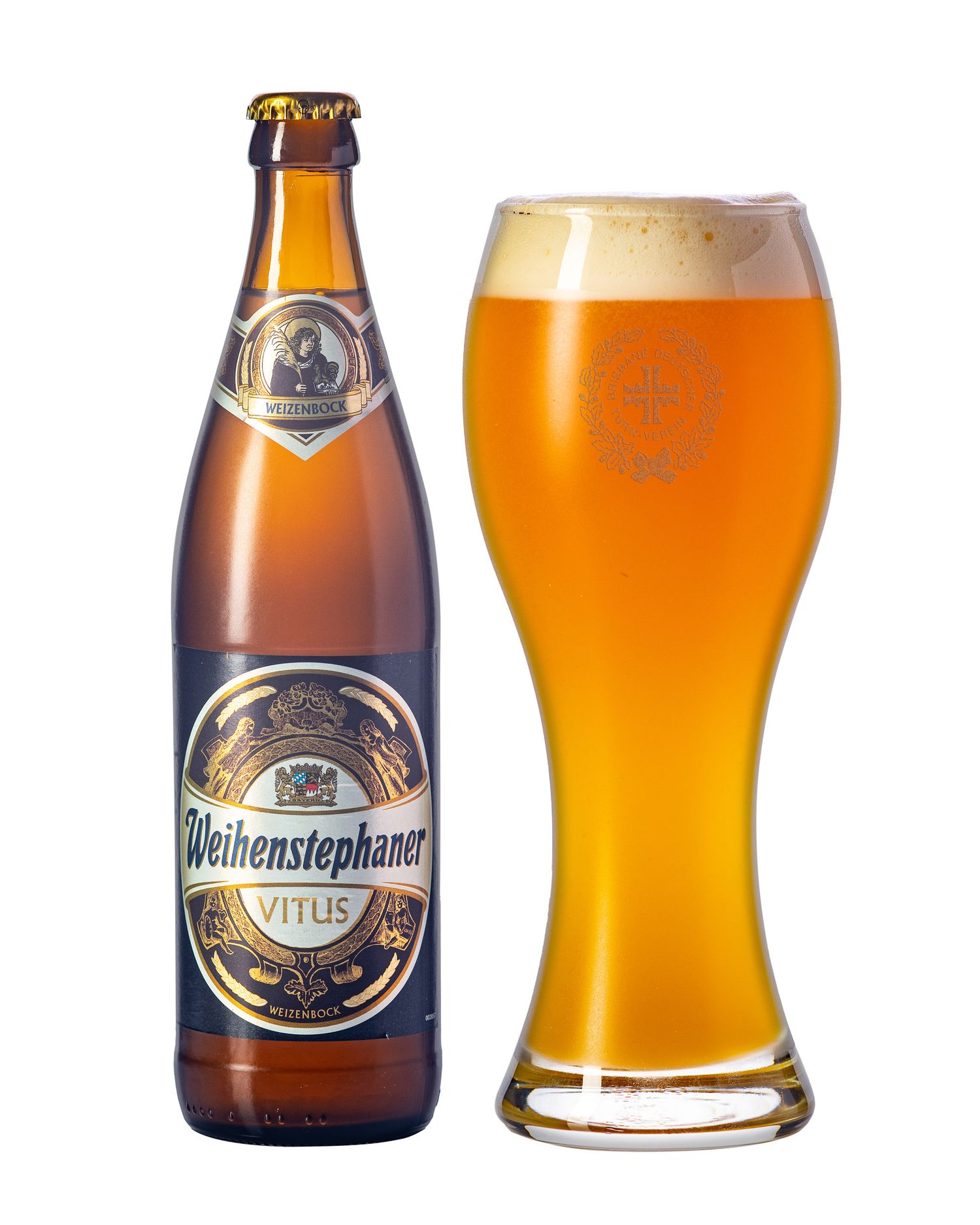 Weihenstephaner Vitus Weizenbock beer bottle beside a full wheat beer glass with frothy head.
