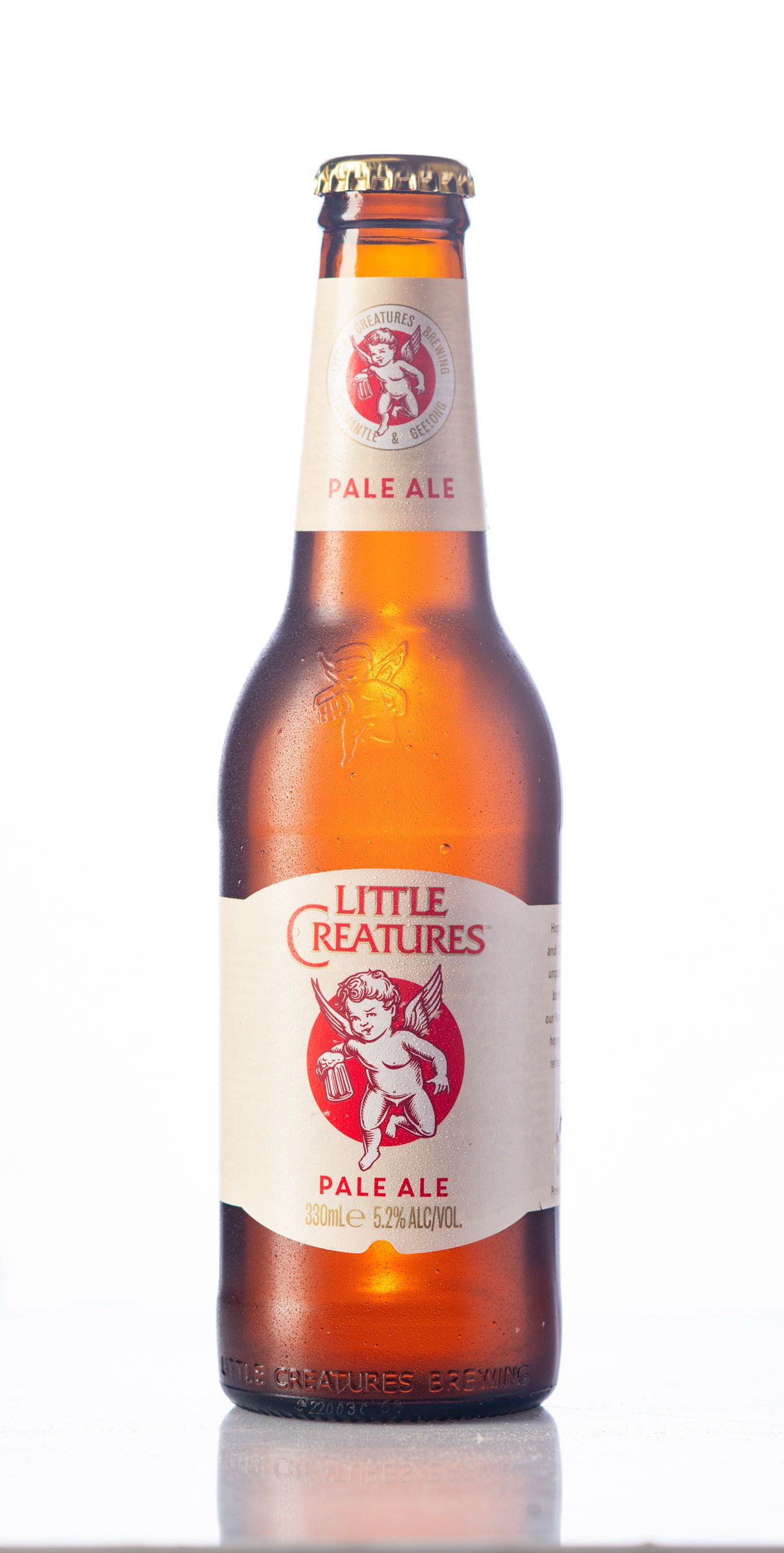 Little Creatures Pale Ale 330ml bottle, 5.2% alcohol, on a white background.