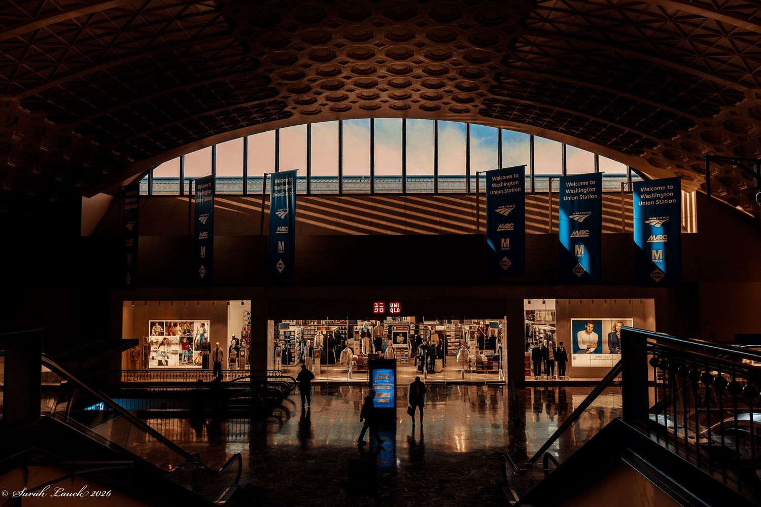 Interior of Union Station in Washington, D.C. with UNIQLO signage and historic architectural details