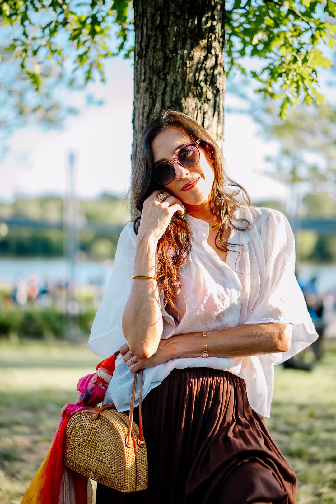 Outdoor portrait of a woman in sunglasses near the Georgetown waterfront