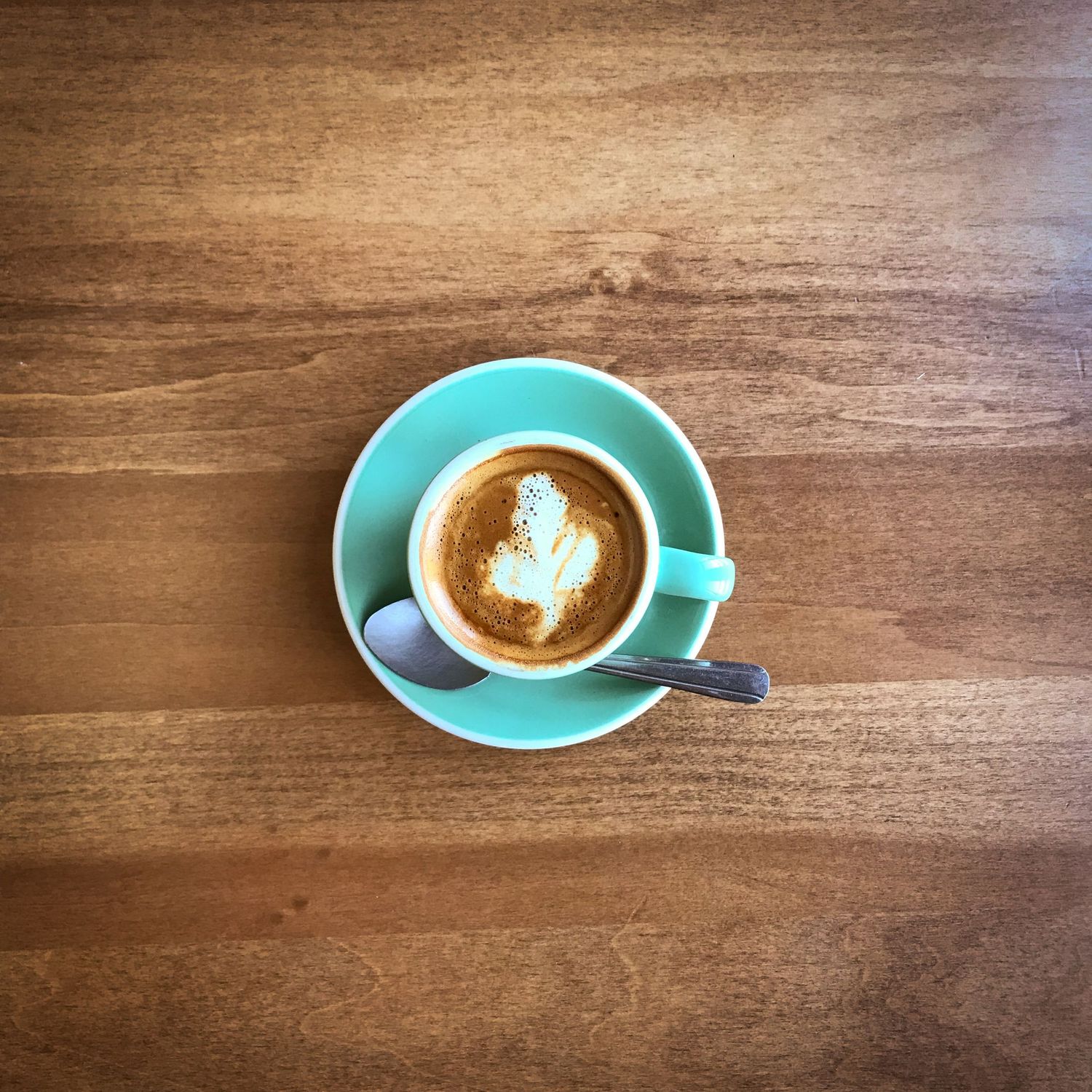 Coffee bar espresso macchiato in a Tiffany blue cup
