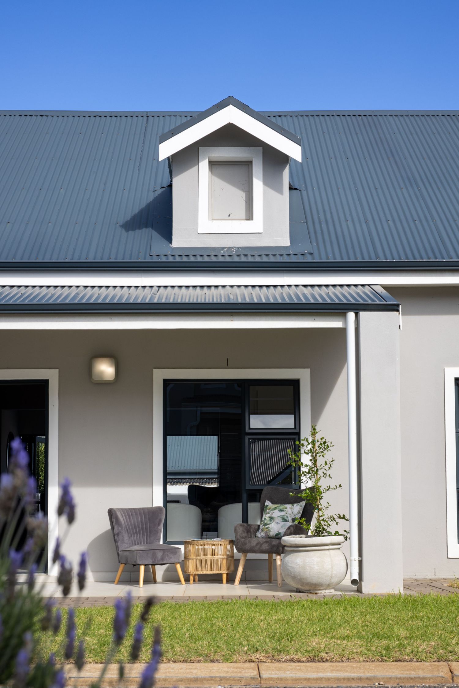 Modern house on a bright sunny day with lavender