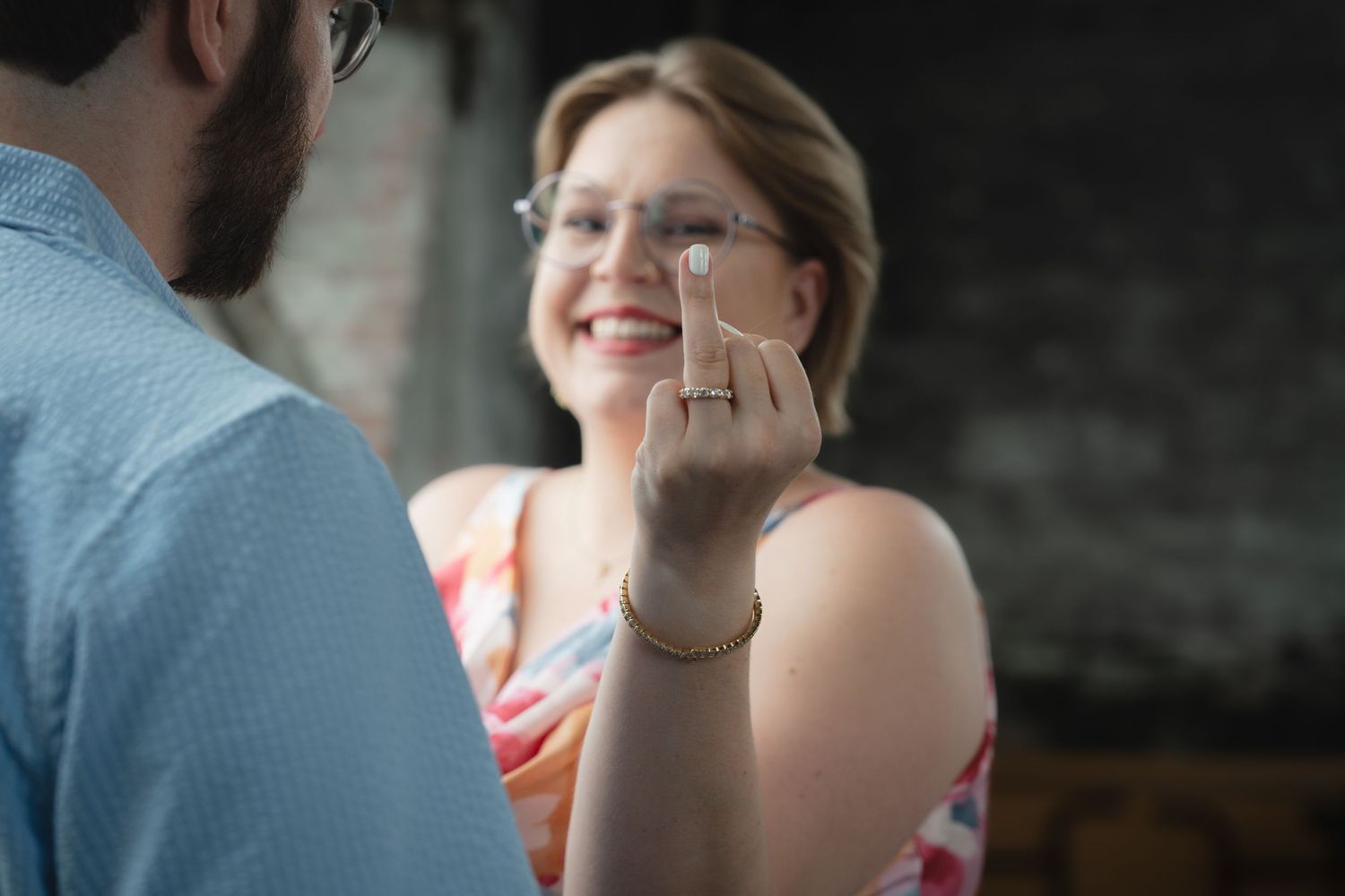 Candid engagement photos showing genuine smiles and connection.