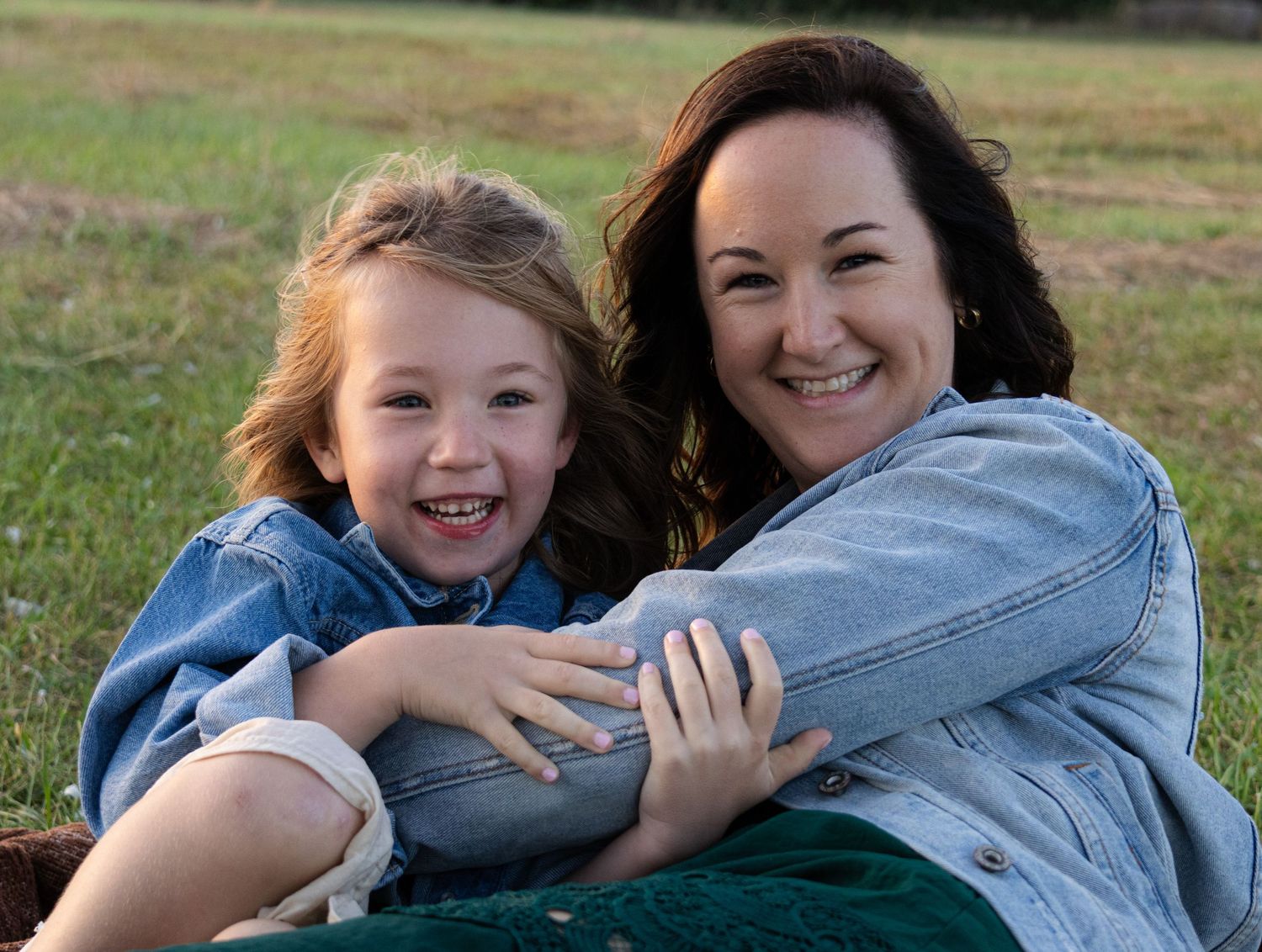 A sweet candid moment from this sunset mommy-and-me session.