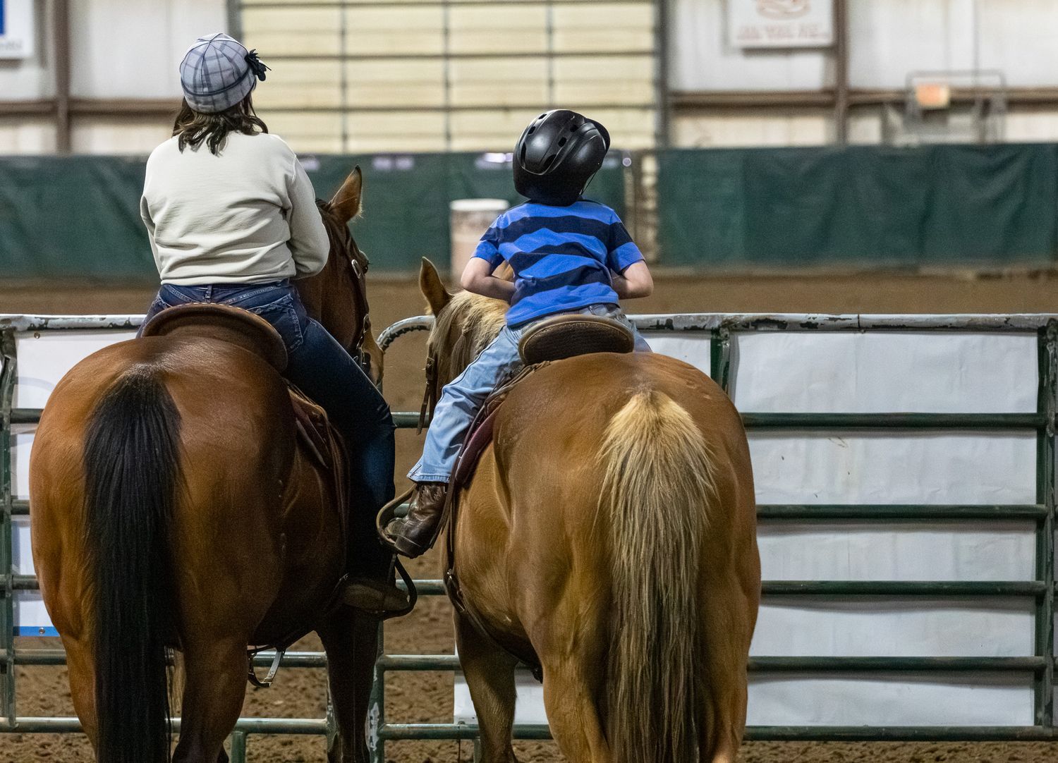 A candid of mother and son before his turn in the arena.