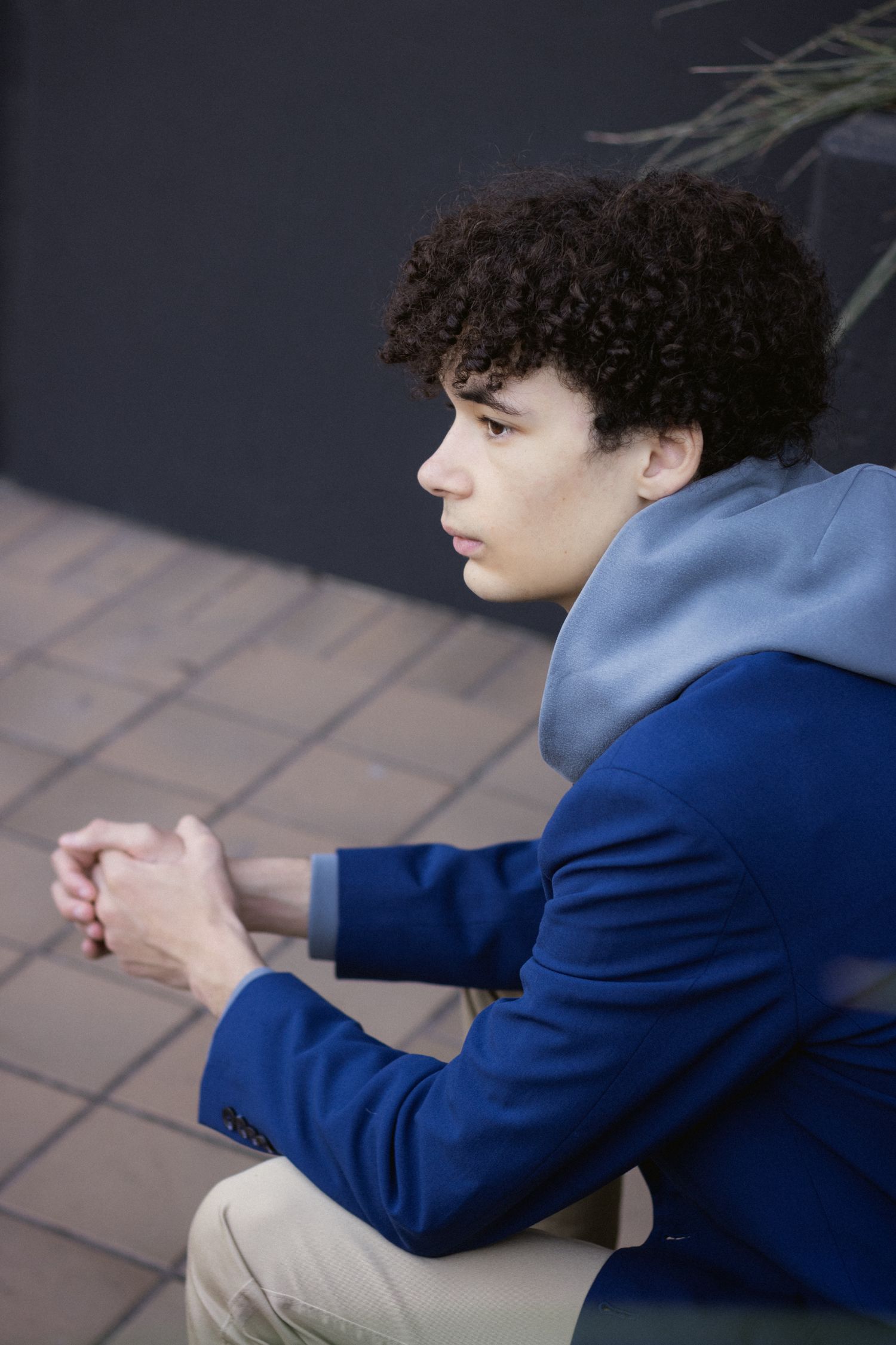 Senior portrait in Austin in Northwest Hills, casual outfit, thoughtful look.