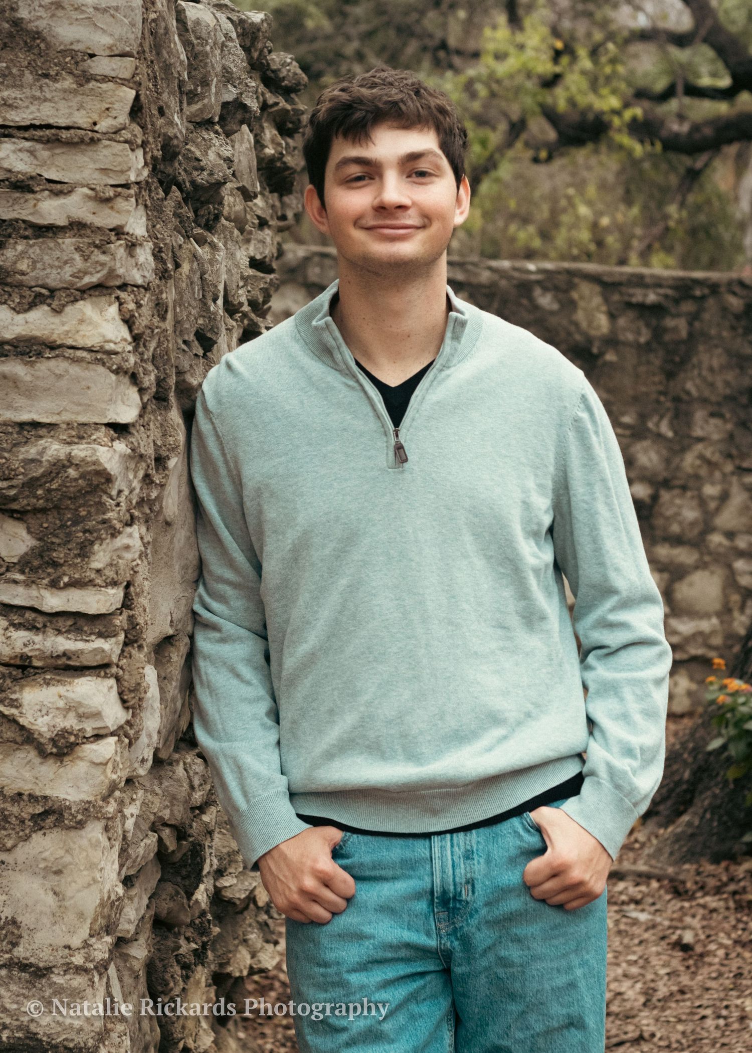 Senior portrait in Austin in Laguna Glora Park, casual look, natural smile.
