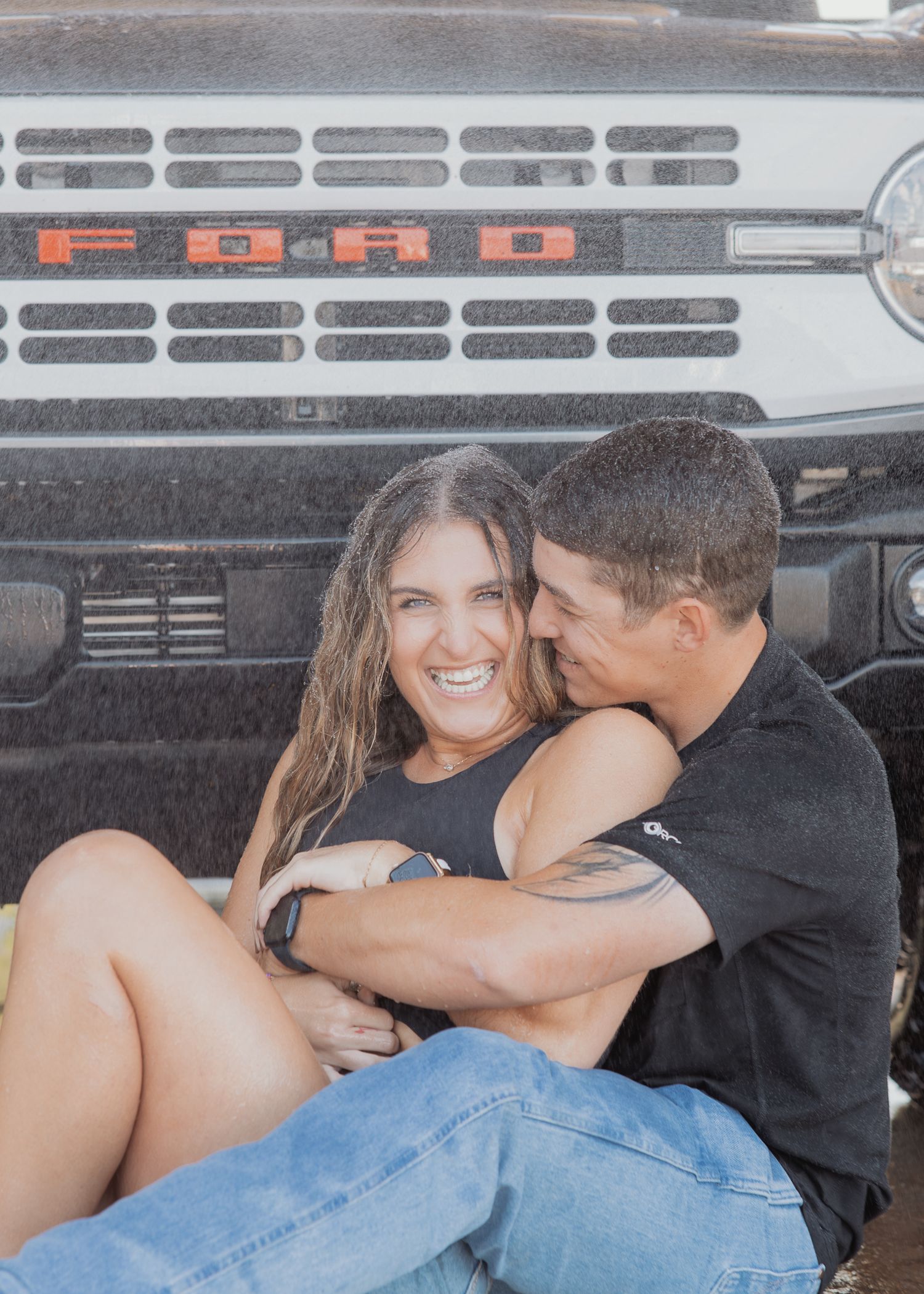 Intimate couple's photoshoot showing progression of poses in front of vintage truck grille.