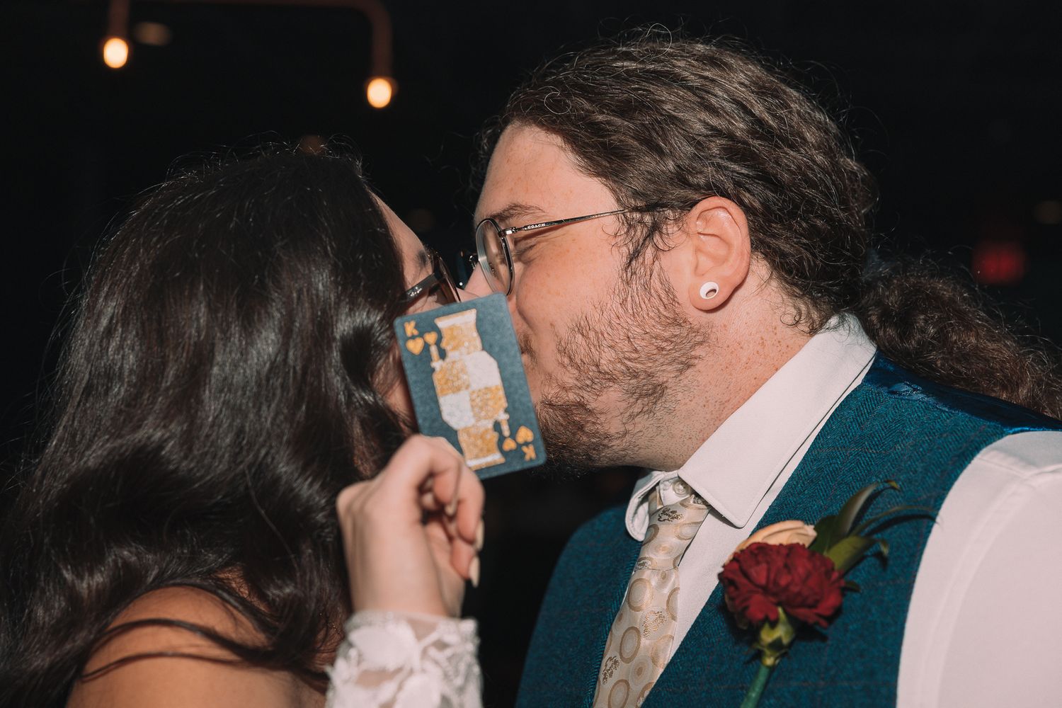 A romantic wedding moment captured in a series of candid photos with warm lighting.