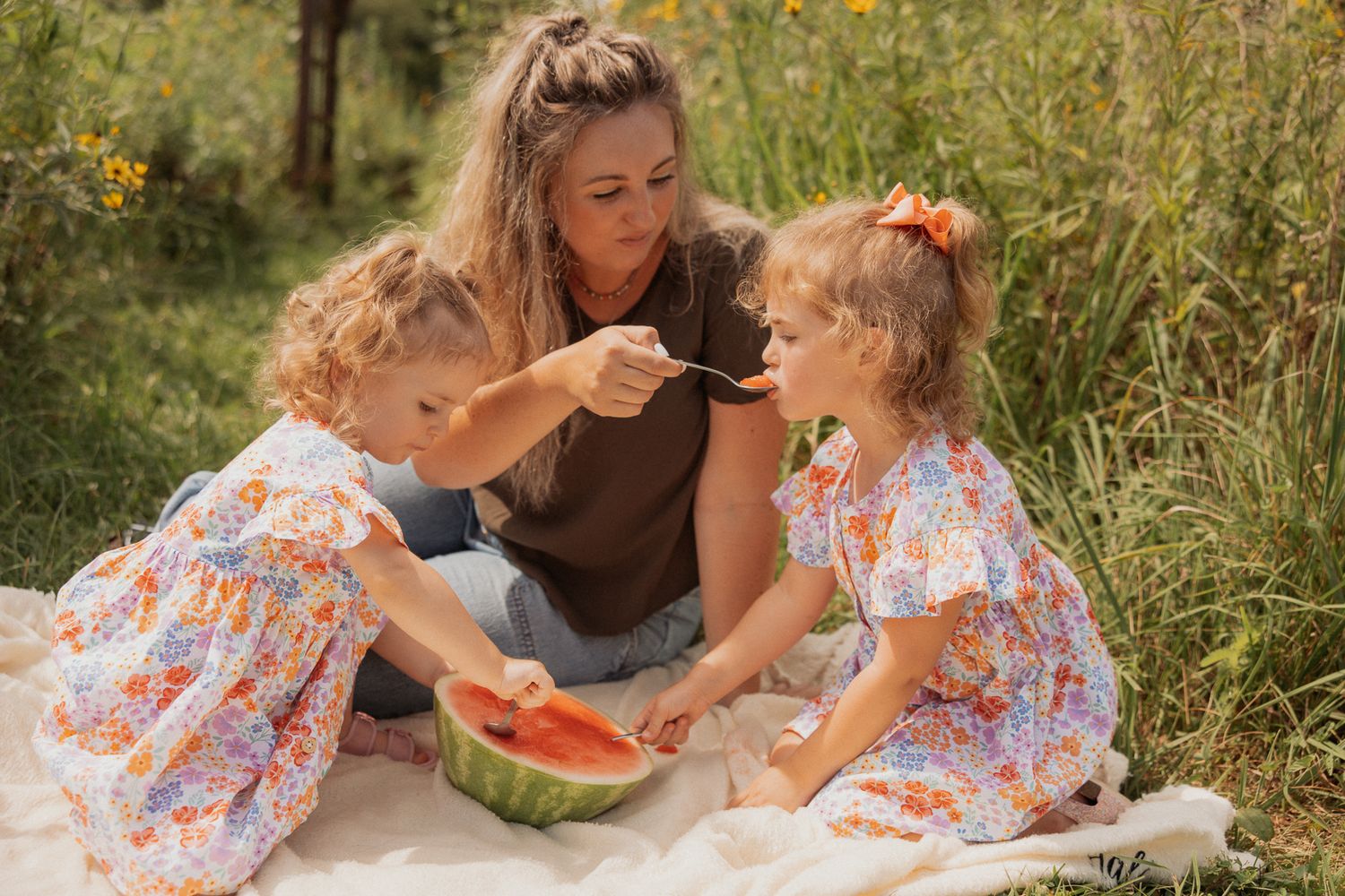 Enjoying fresh watermelon slices during an outdoor summer picnic.