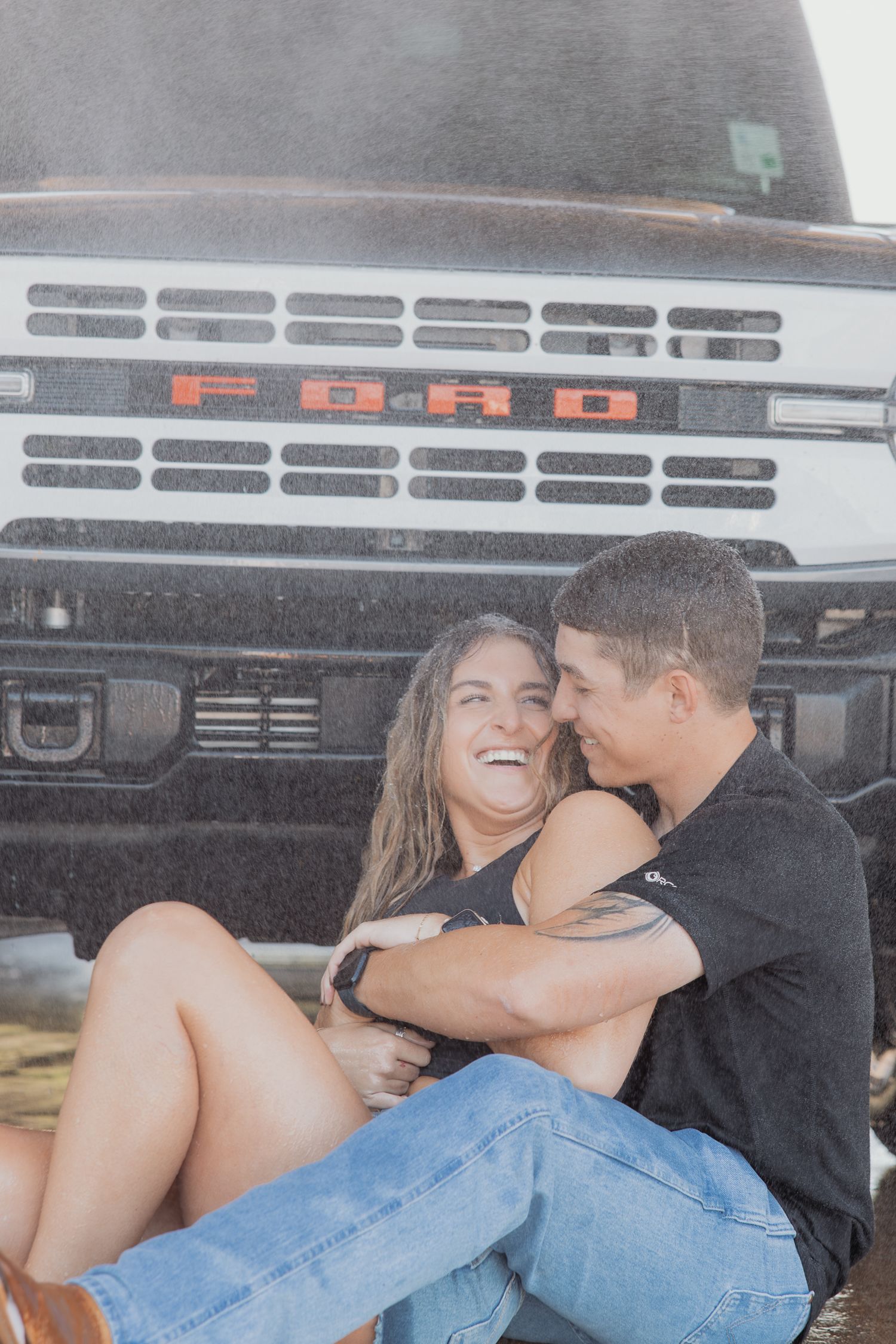 Progressive shots of couple sharing tender moments in front of vintage truck.